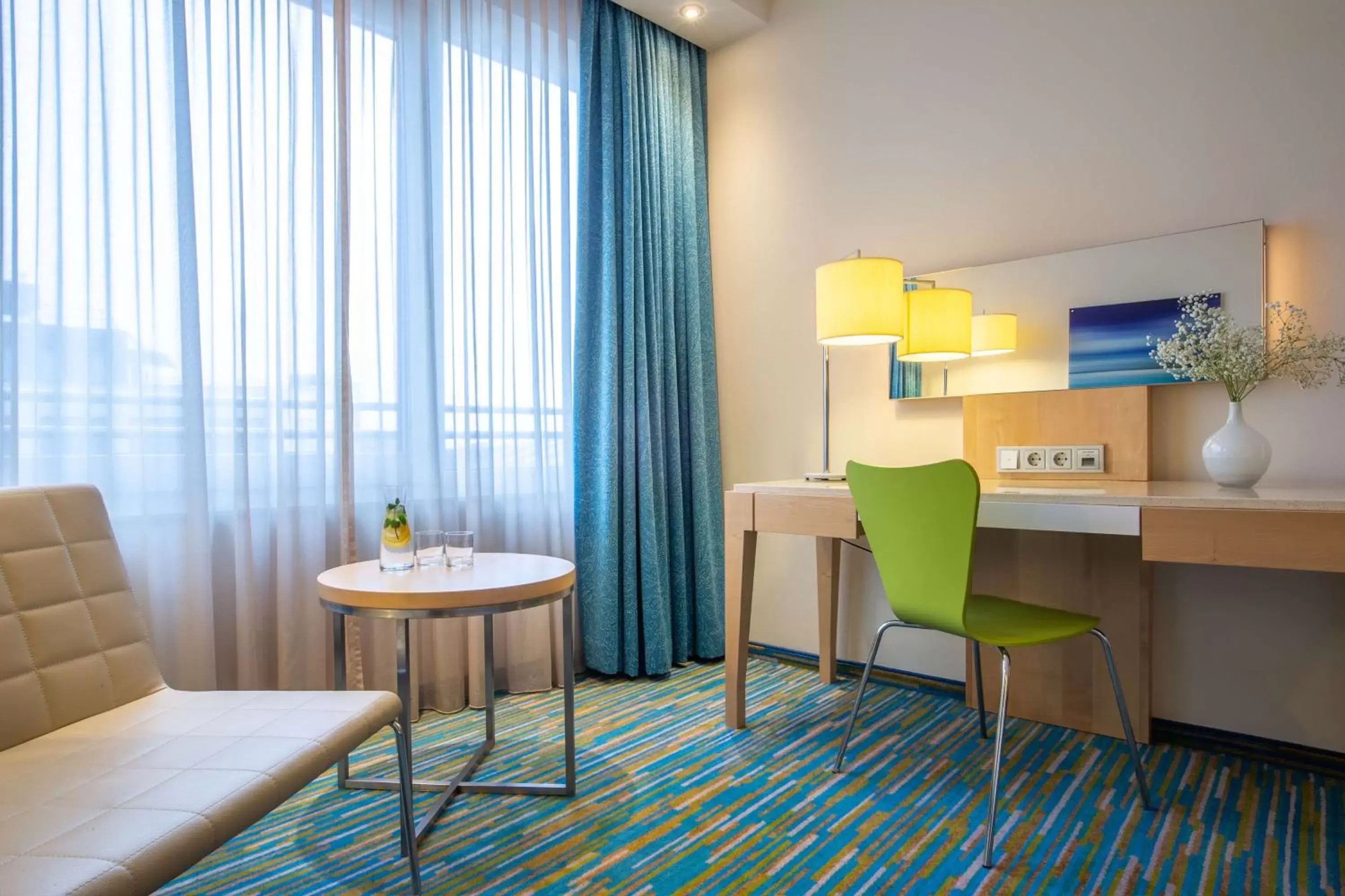 Photo of the whole room, Seating Area in Radisson Blu Hotel, Hamburg Airport