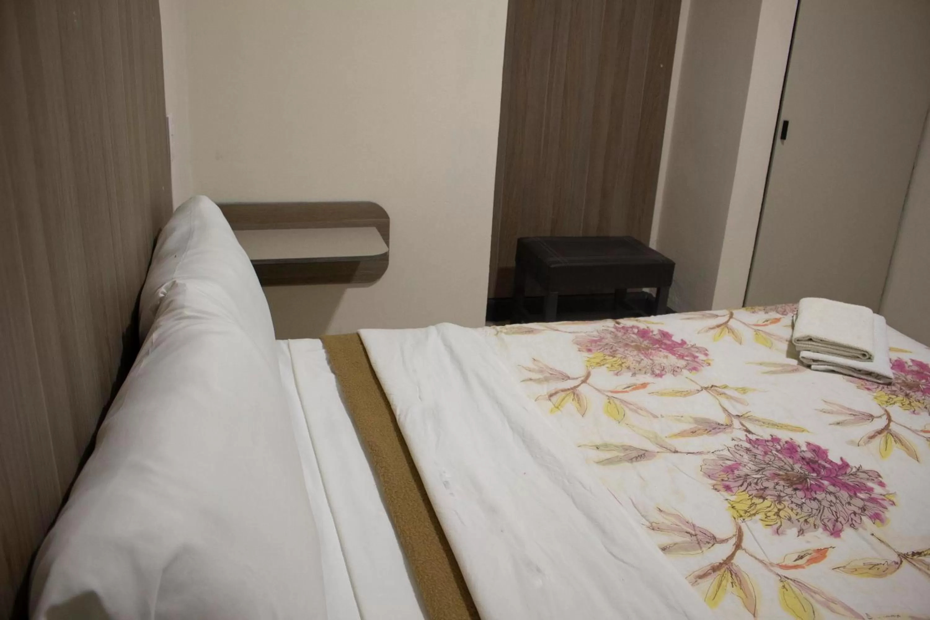 Bed in Hotel Winn Comfort