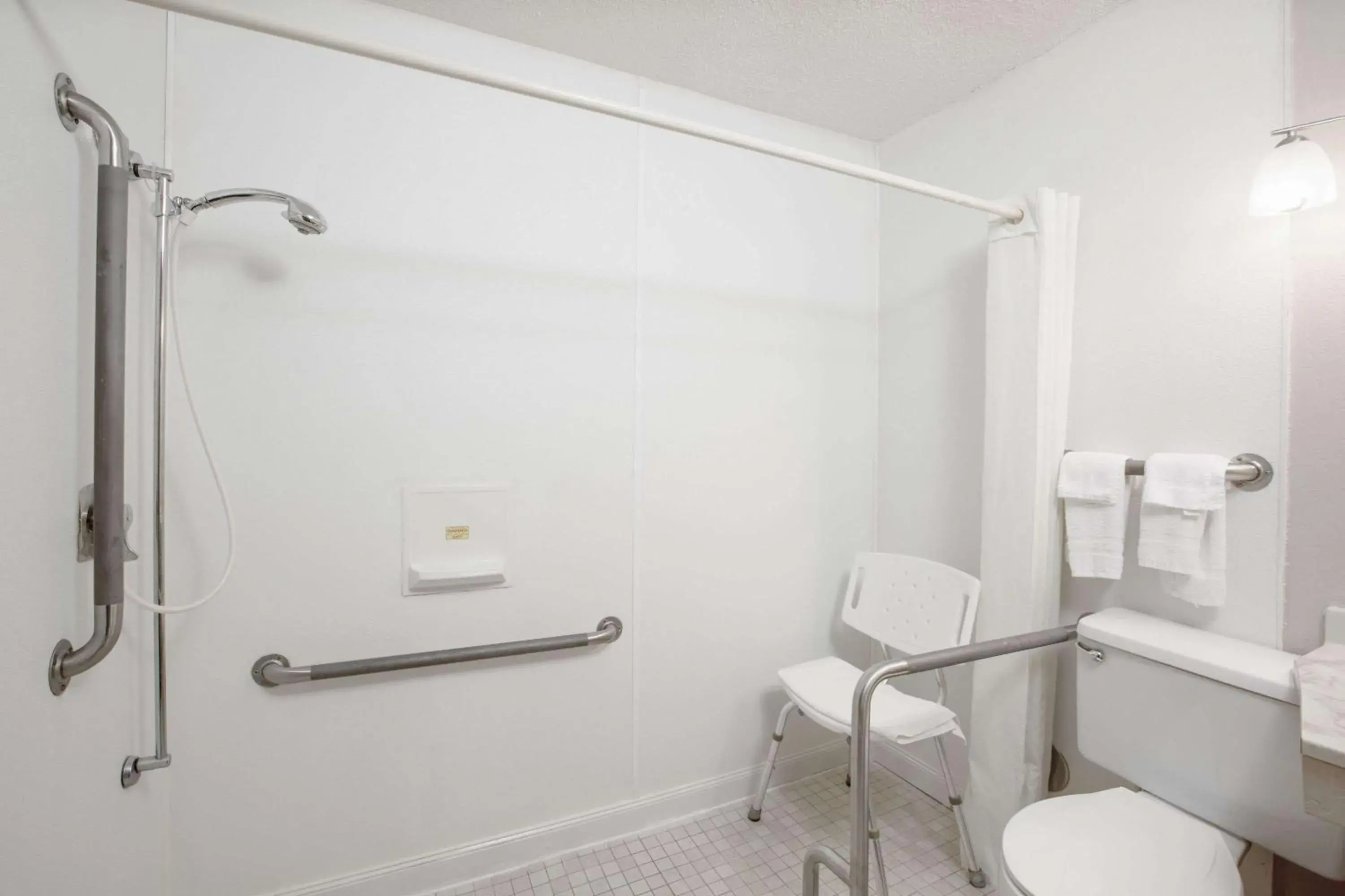 Bathroom in Super 8 by Wyndham Worthington Minnesota