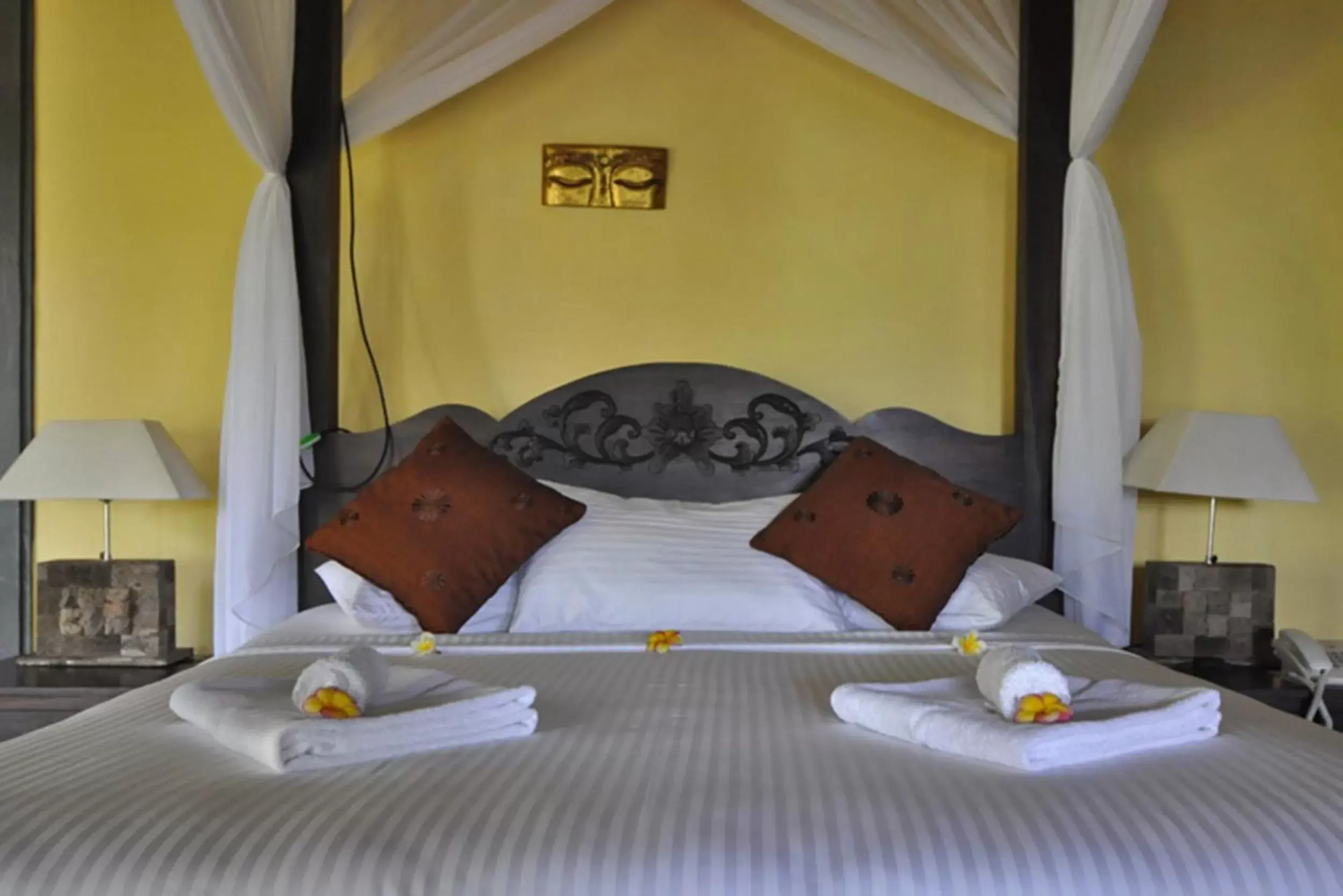 Bedroom, Bed in Puri Mangga Sea View Resort and Spa