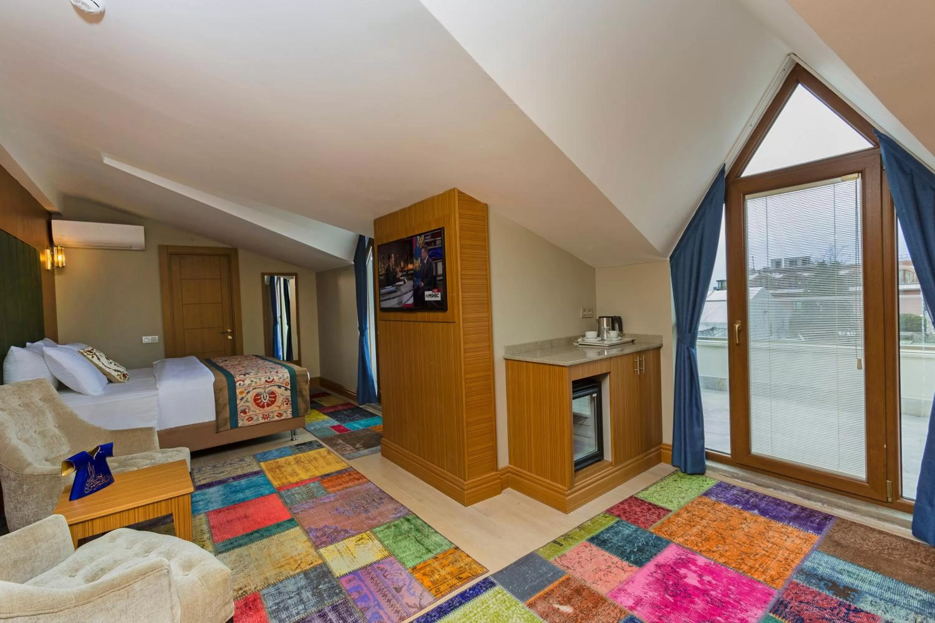 Photo of the whole room, Bed in Obelisk Hotel & Suites