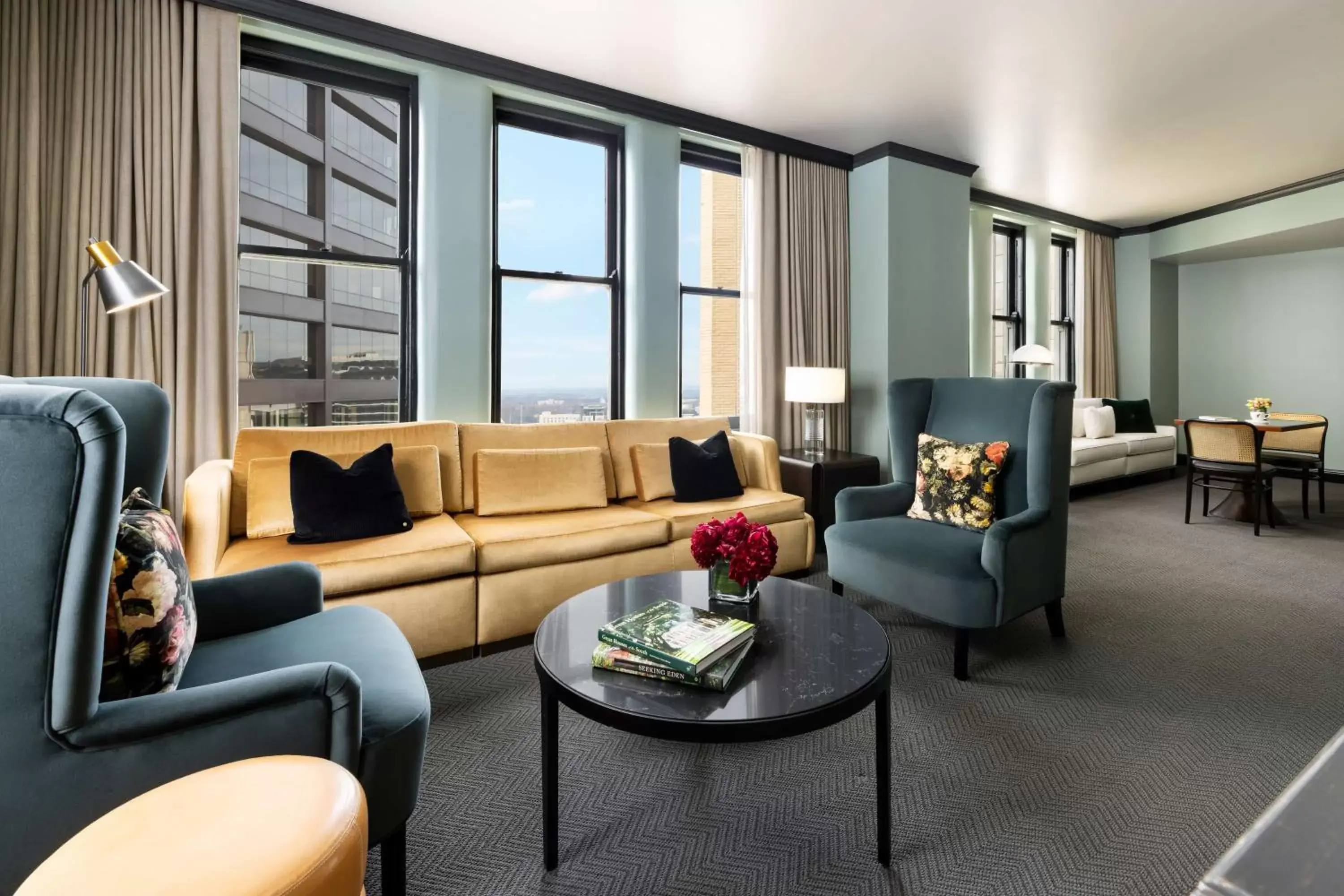 Living room, Seating Area in The Candler Hotel Atlanta, Curio Collection by Hilton