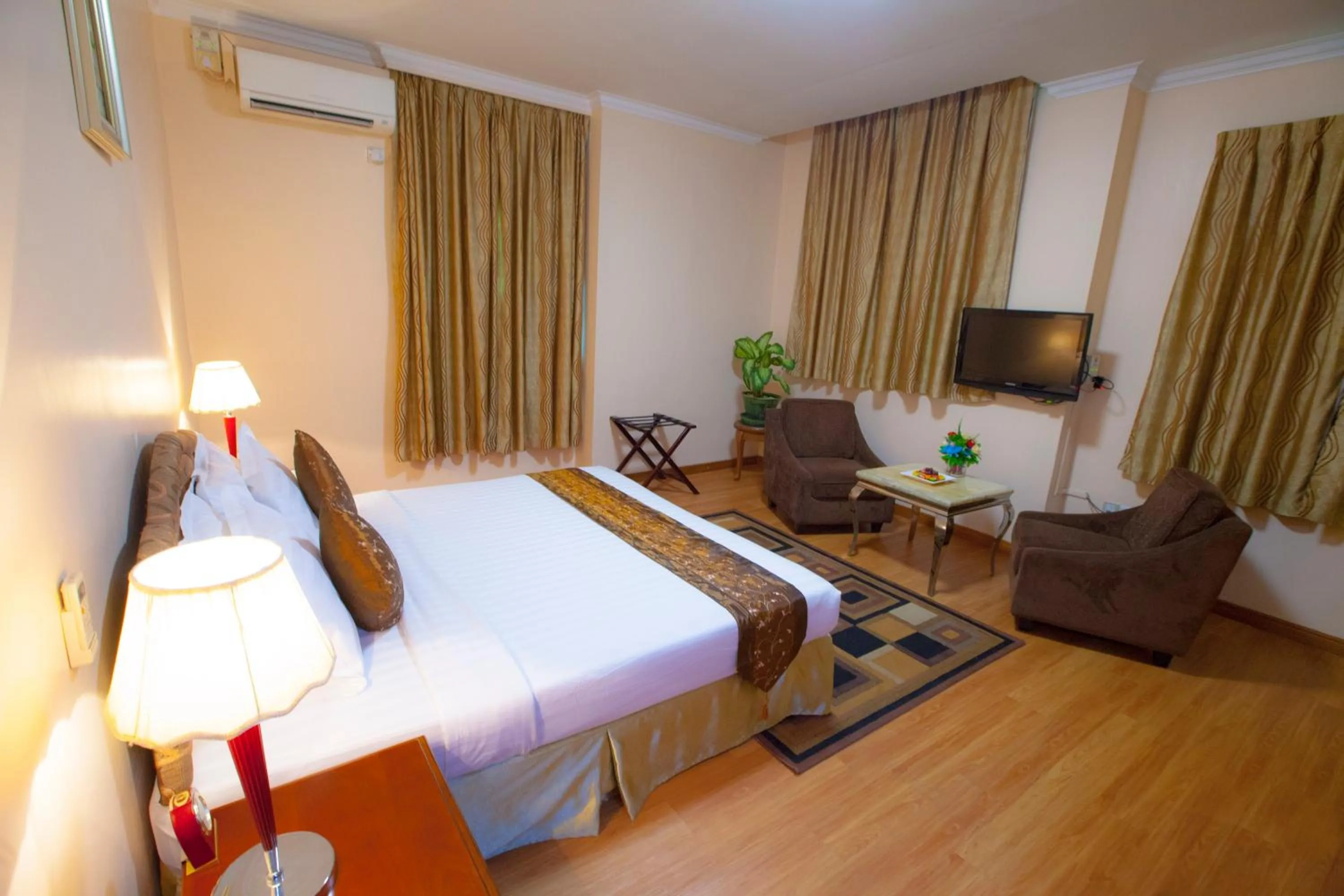 Bed in Grand Palace Hotel