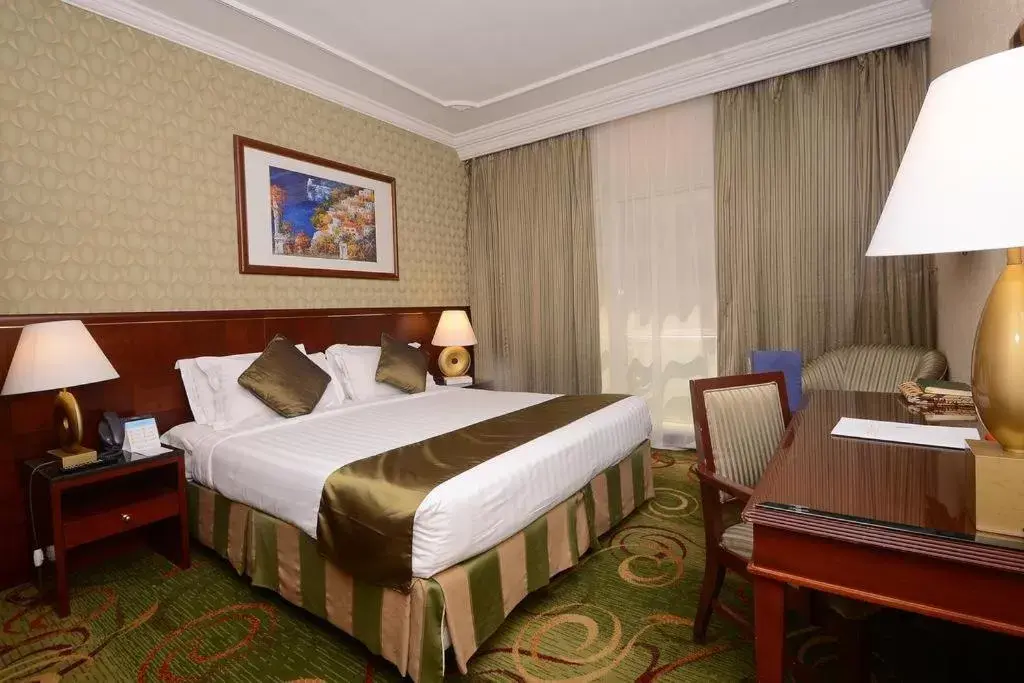 Bed in Al Rawda Royal Inn