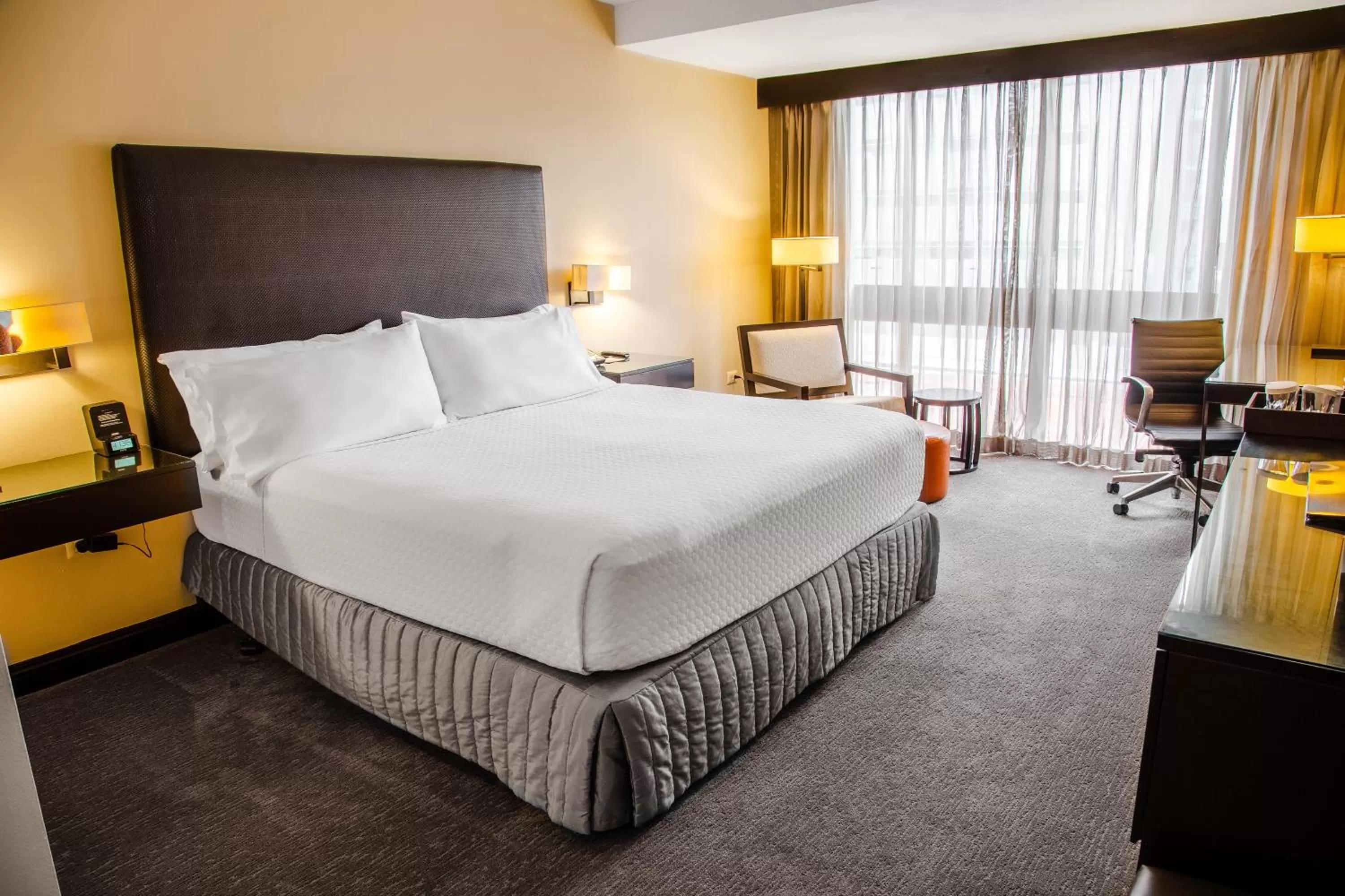 Photo of the whole room, Bed in Crowne Plaza San Salvador, an IHG Hotel