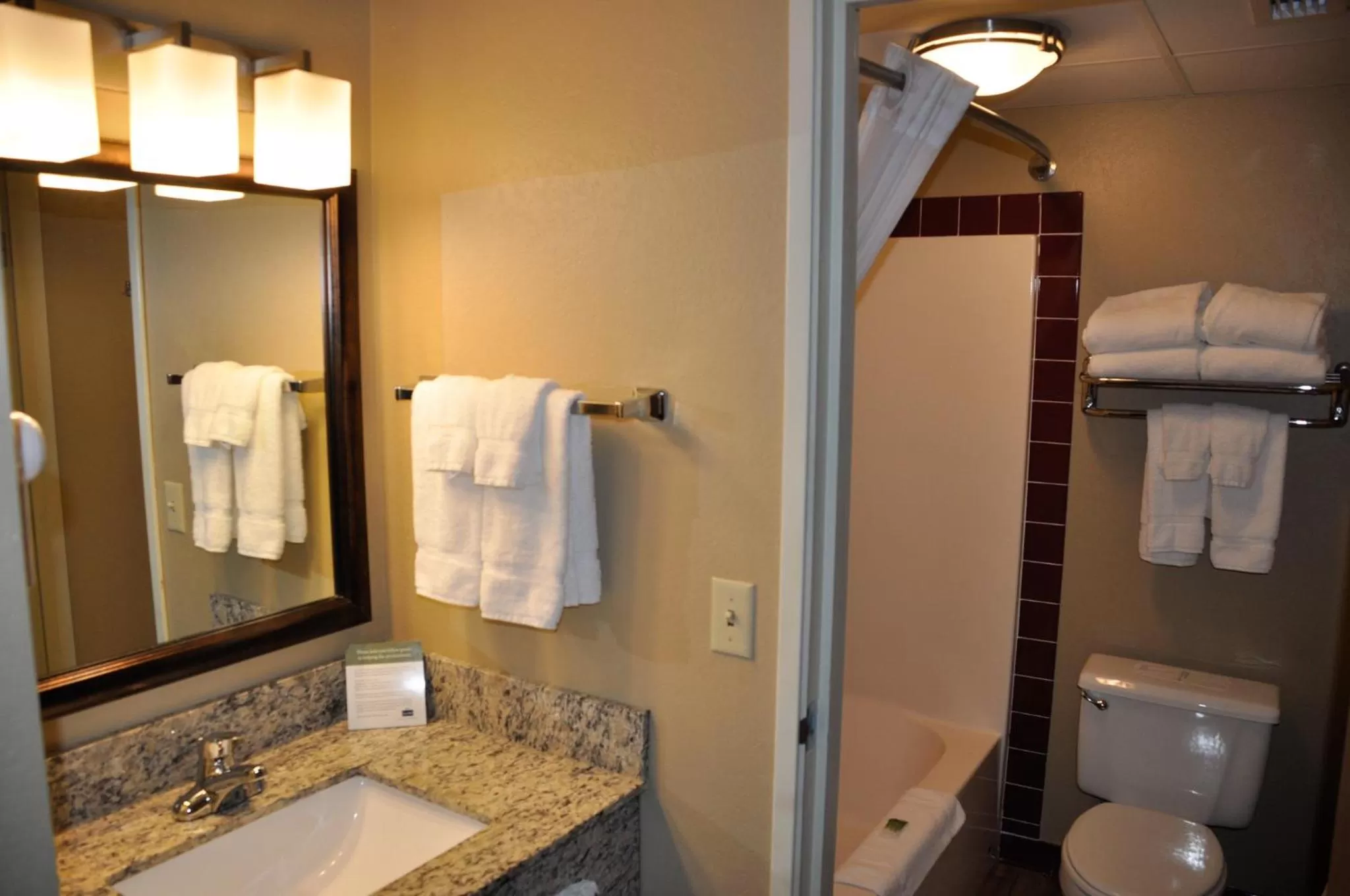 Shower in AmericInn by Wyndham Clear Lake