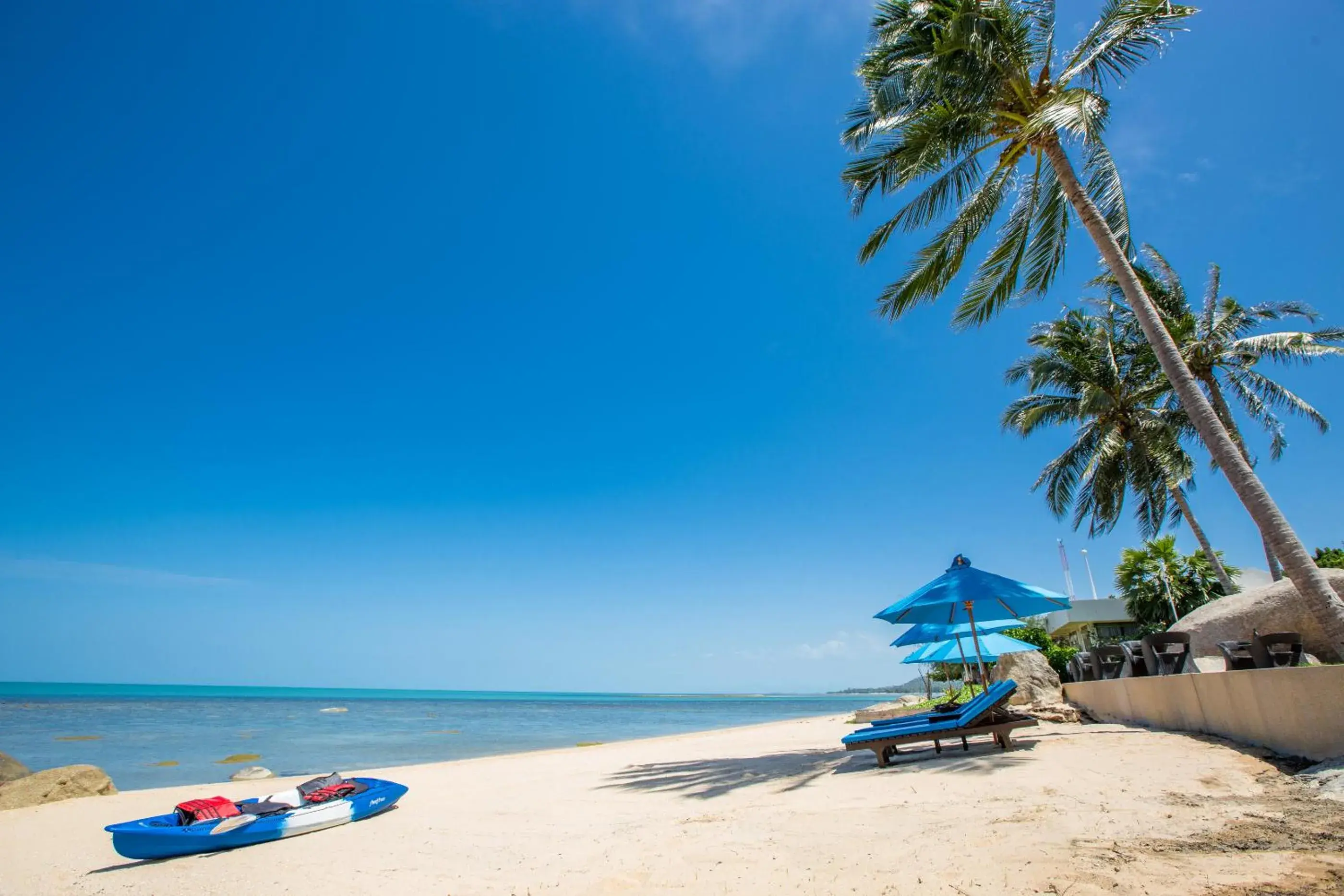 Beach in Royal Beach Boutique Resort & Spa Koh Samui - SHA Extra Plus