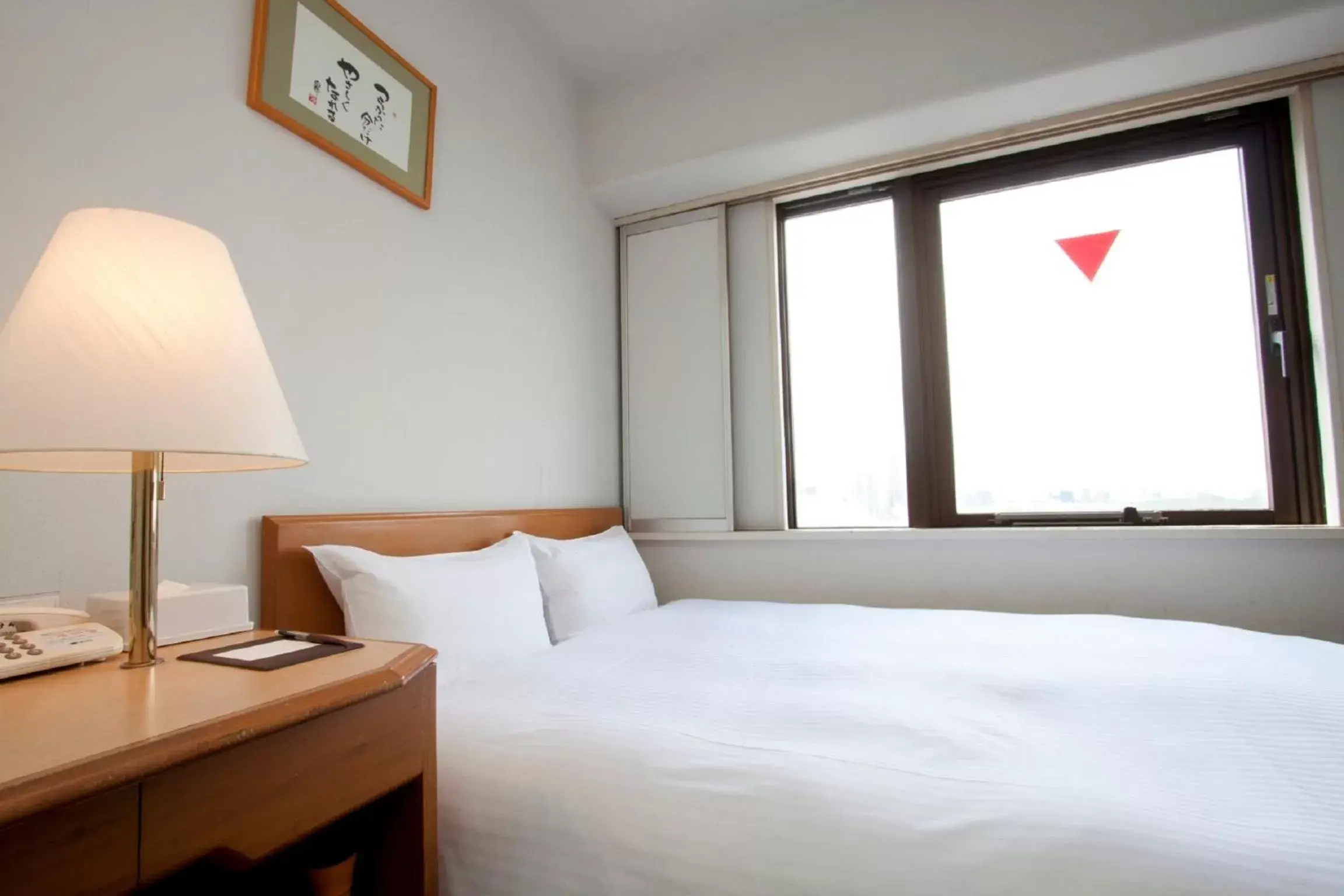 Bed in Smile Hotel Sugamo