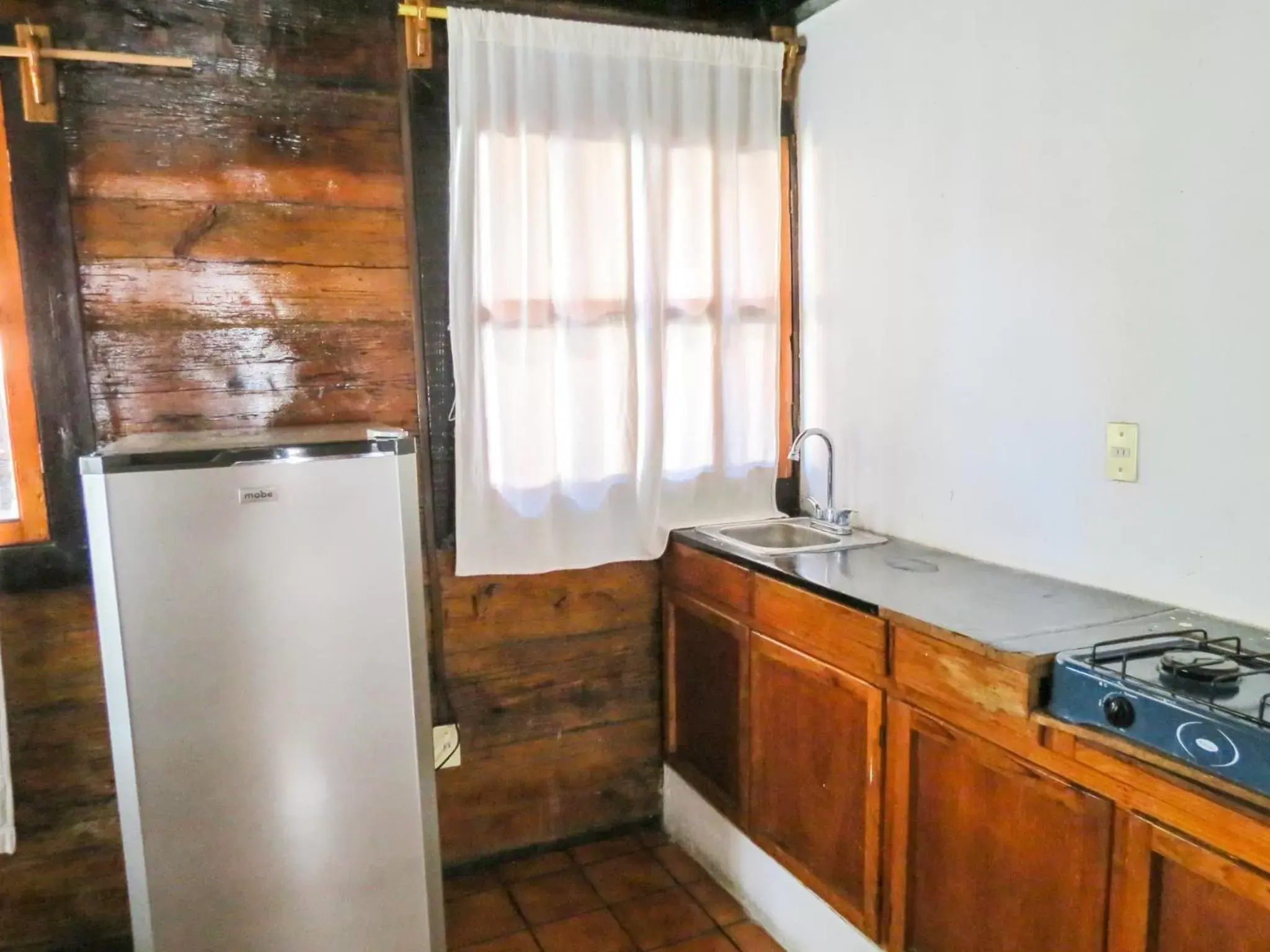 Kitchen/Kitchenette in Cabañas Yunuén by Rotamundos