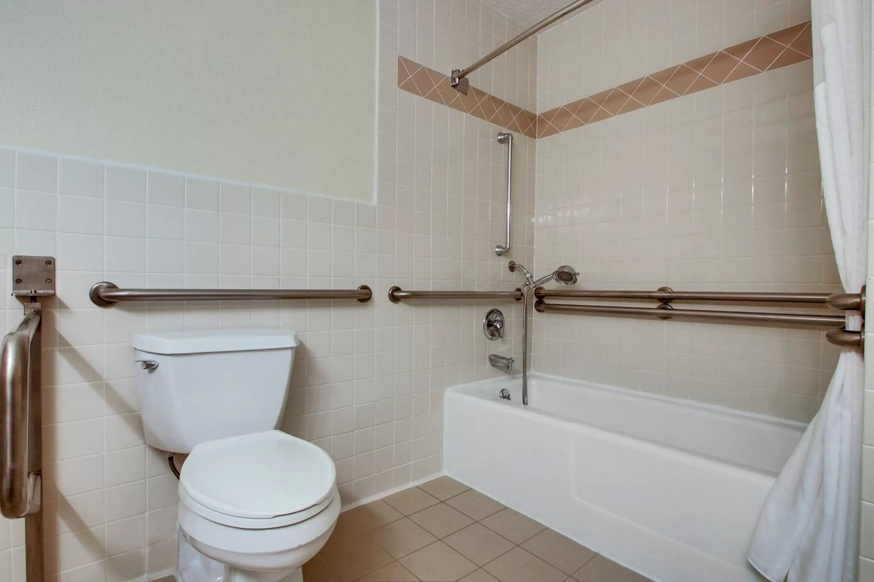 Photo of the whole room, Bathroom in Holiday Inn Westbury-Long Island, an IHG Hotel