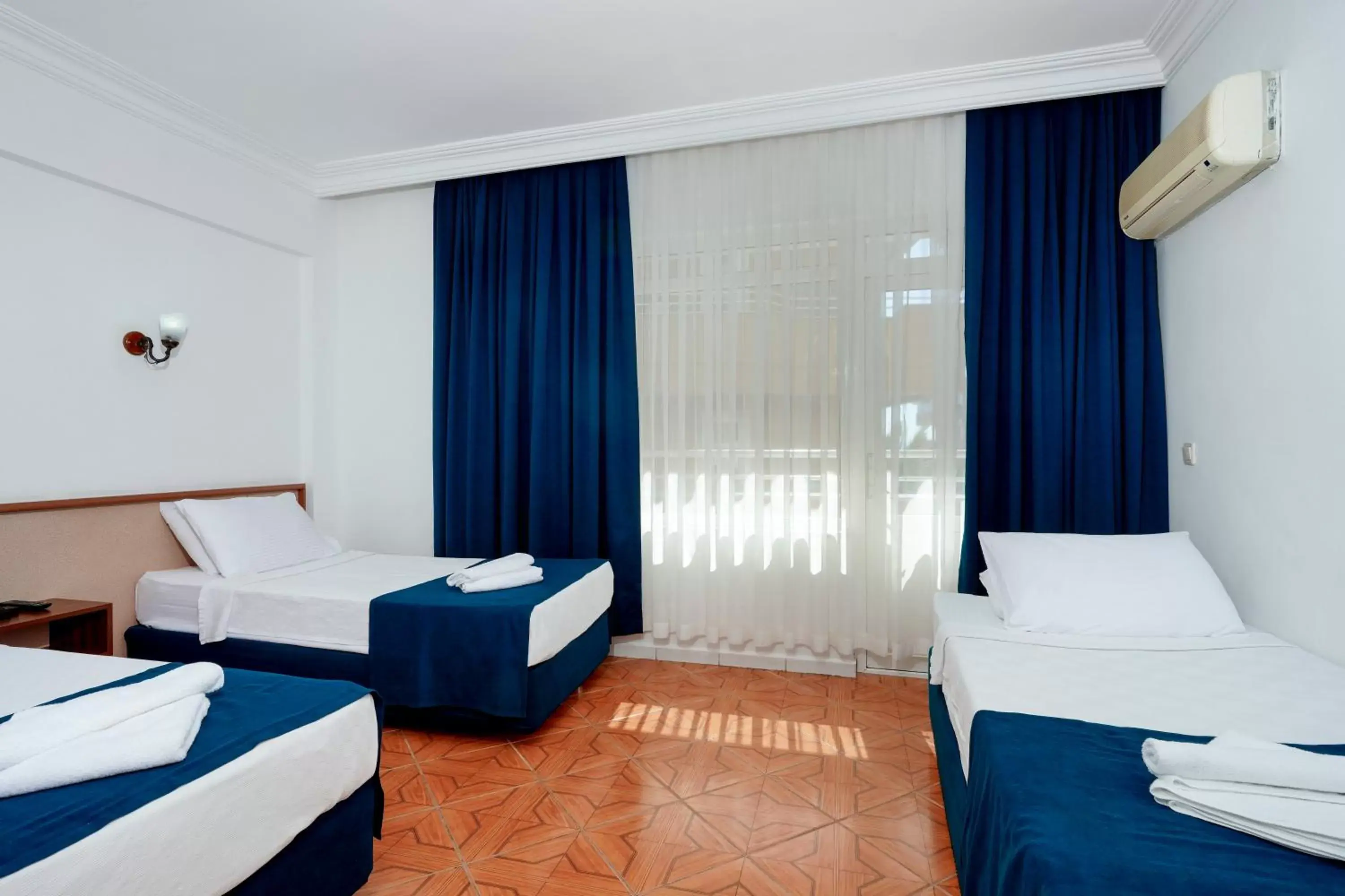 Standard Triple Room in Ozcan Hotel Standard Triple Room in Ozcan Hotel