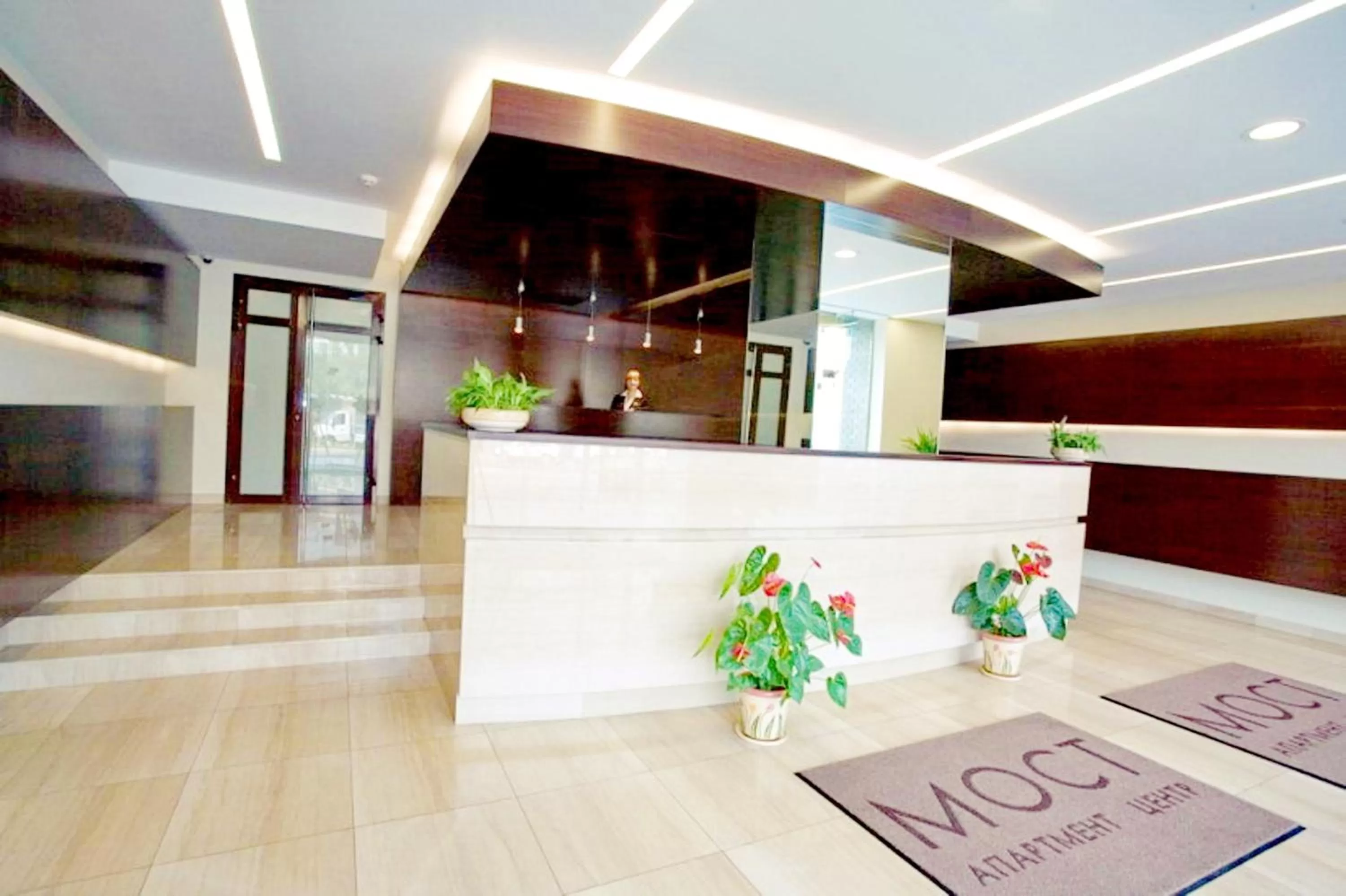 Staff in Most City Apart-Hotel