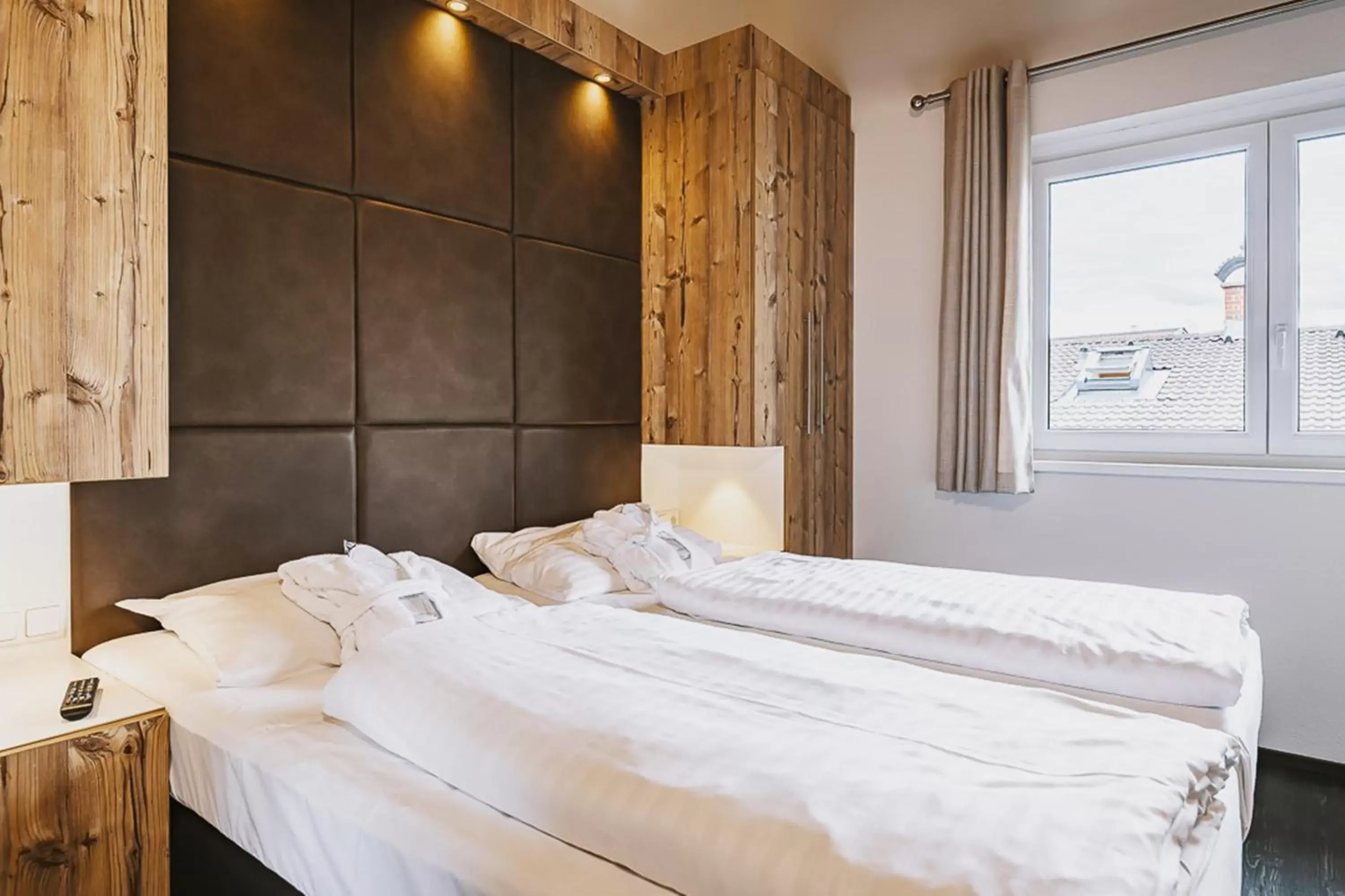 Photo of the whole room, Bed in AvenidA Mountain Lodges Kaprun