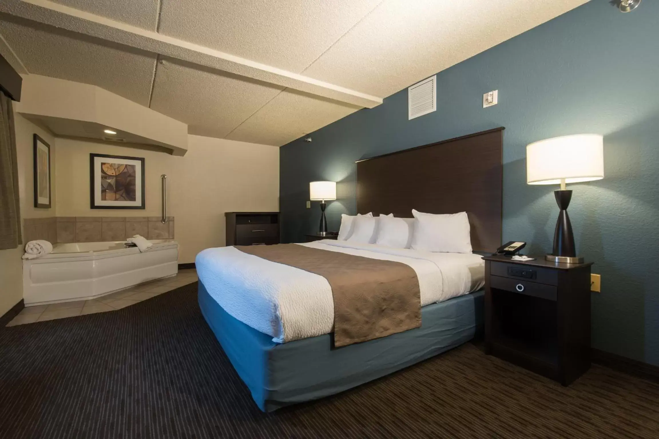 Hot Tub, Bed in AmericInn by Wyndham Mounds View Minneapolis