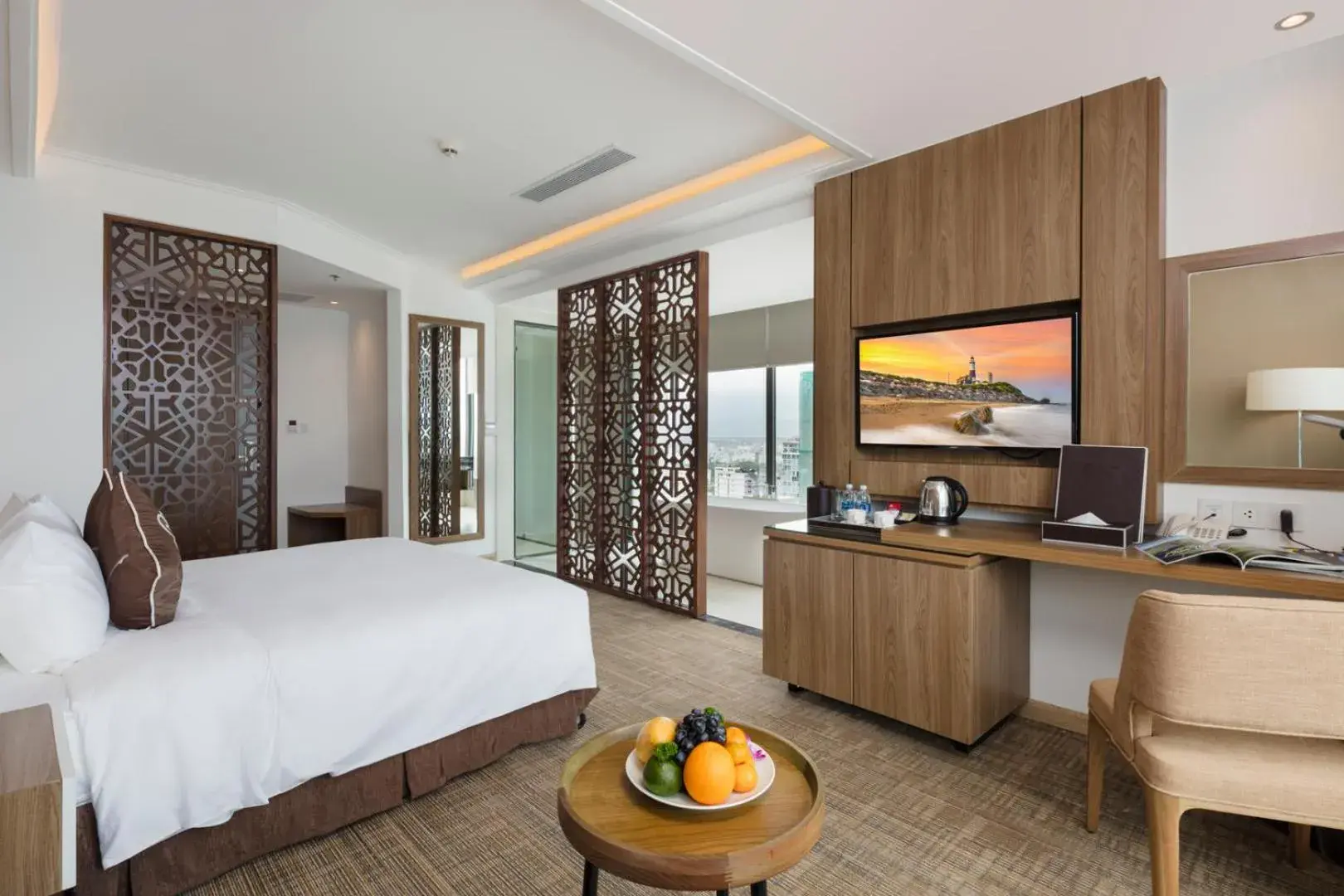 Toilet, TV/Entertainment Center in Asteria Comodo Nha Trang Hotel