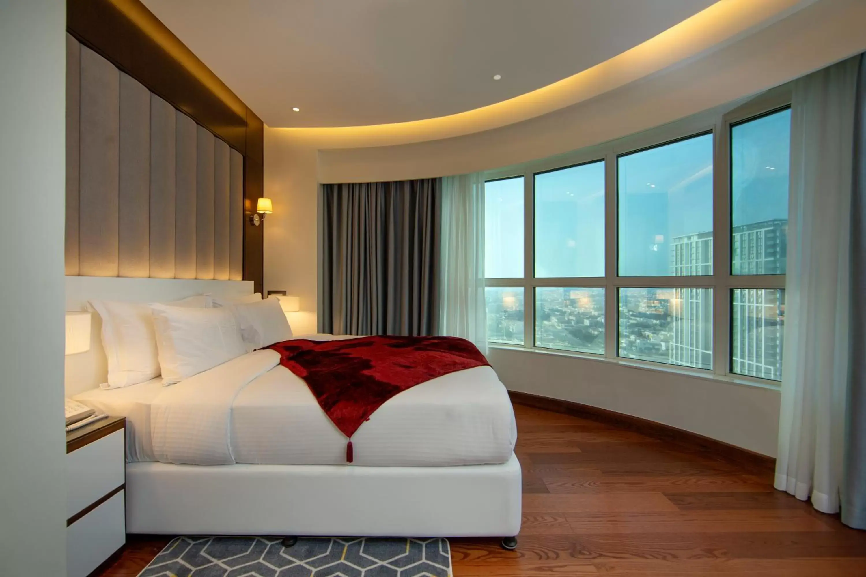 Bed in Number One Tower Suites Hotel