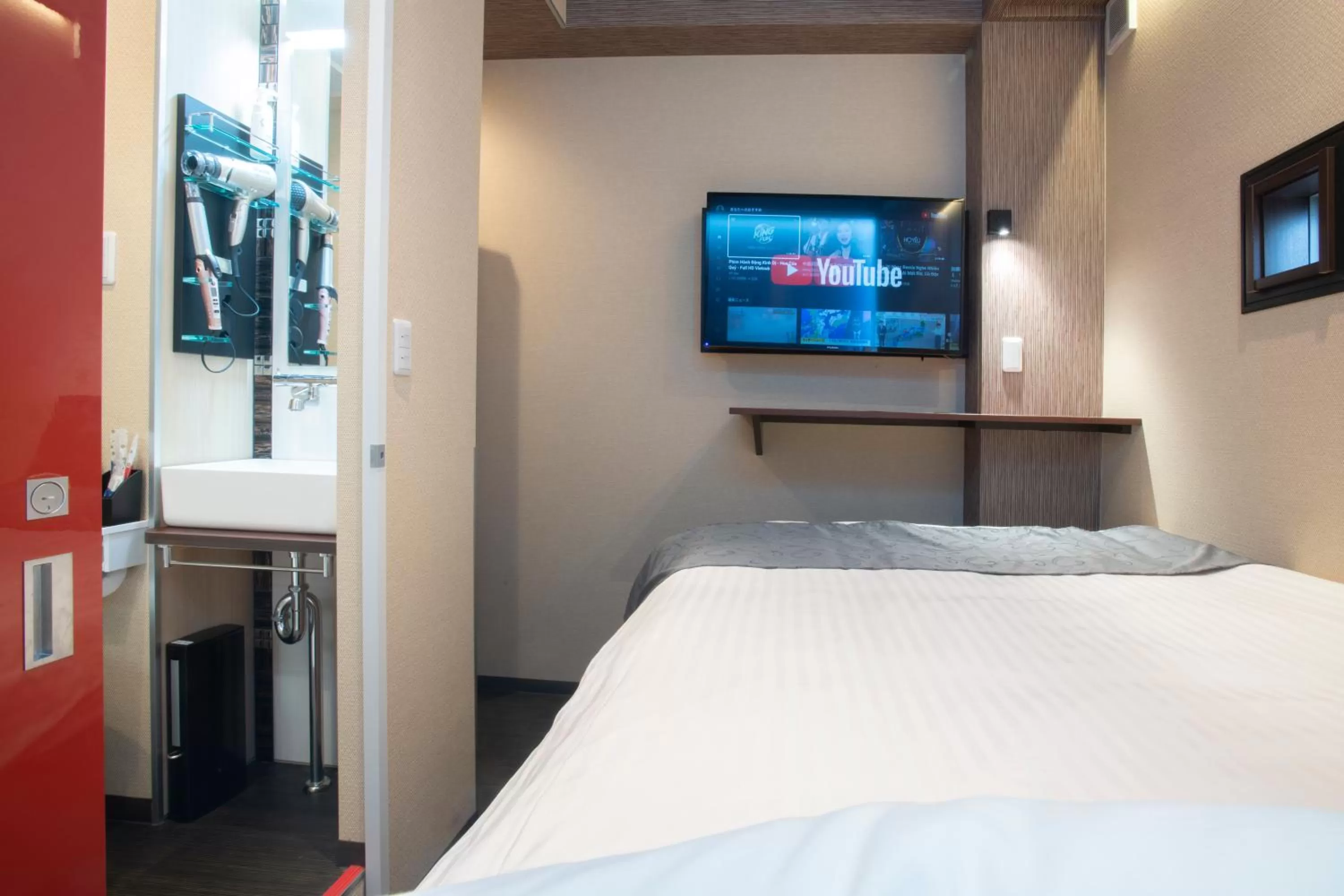 Photo of the whole room, Bed in Hotel Xcell Hiroshima Nagarekawa