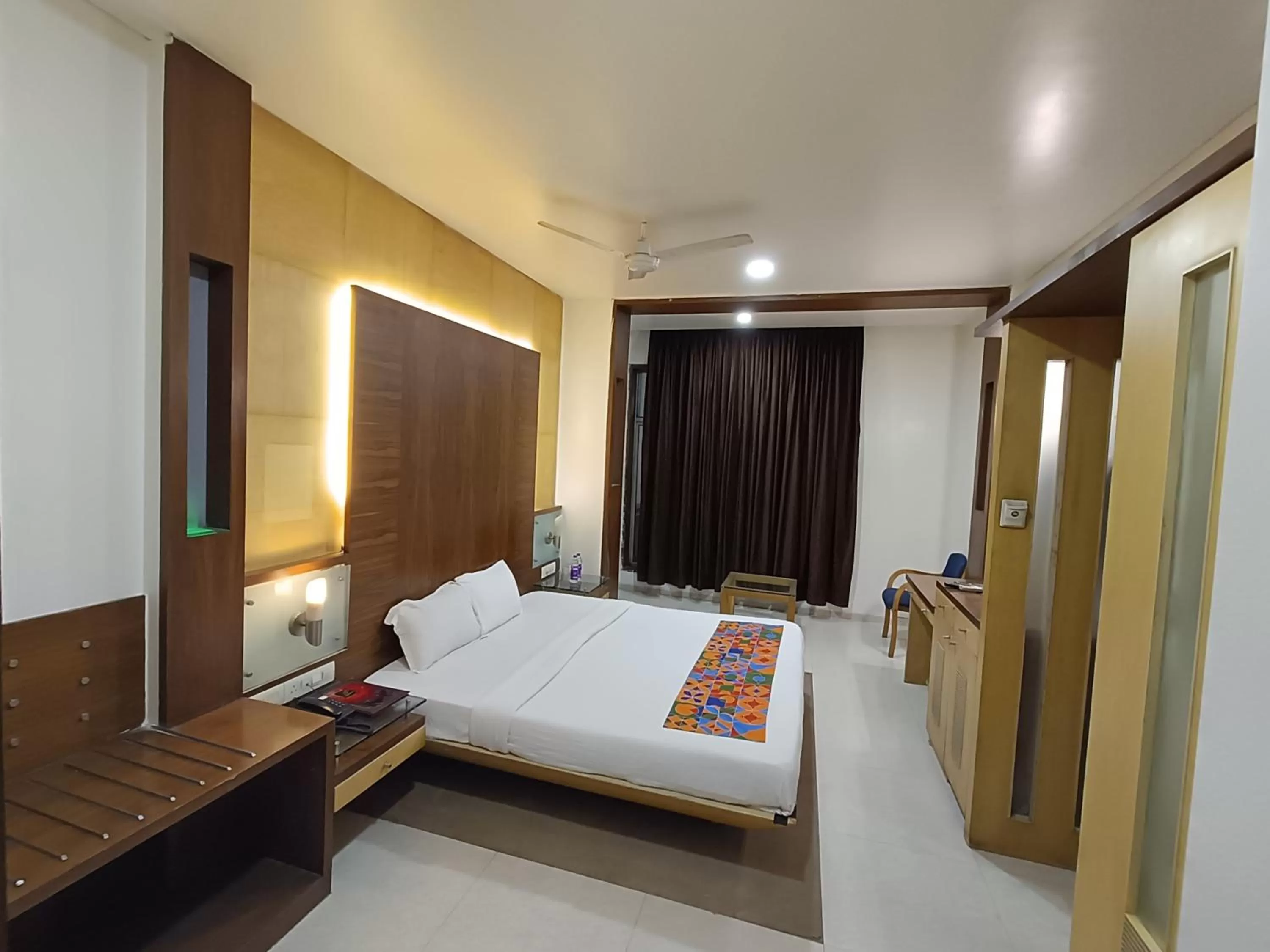 Bed in Rapid Lakme Executive Hotel