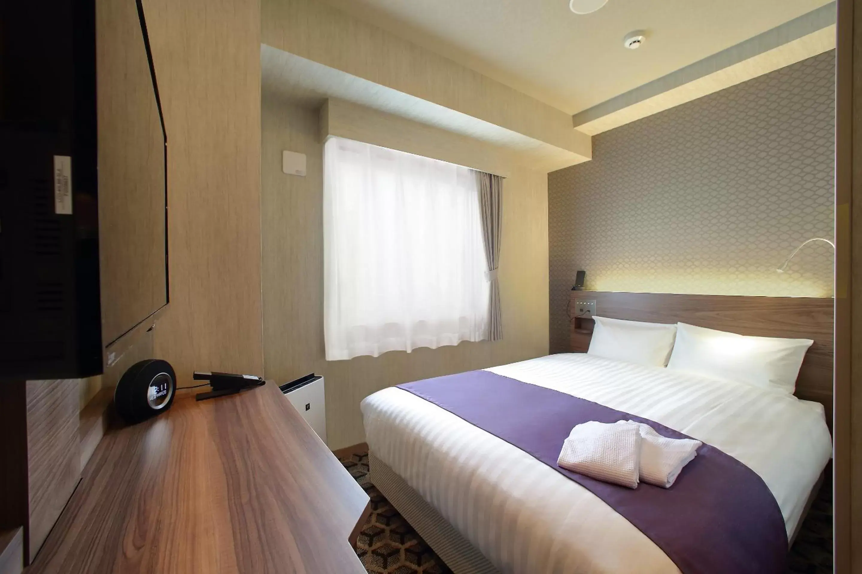 Bed in Hotel Oriental Express Osaka Shinsaibashi Bed in Hotel Oriental Express Osaka Shinsaibashi