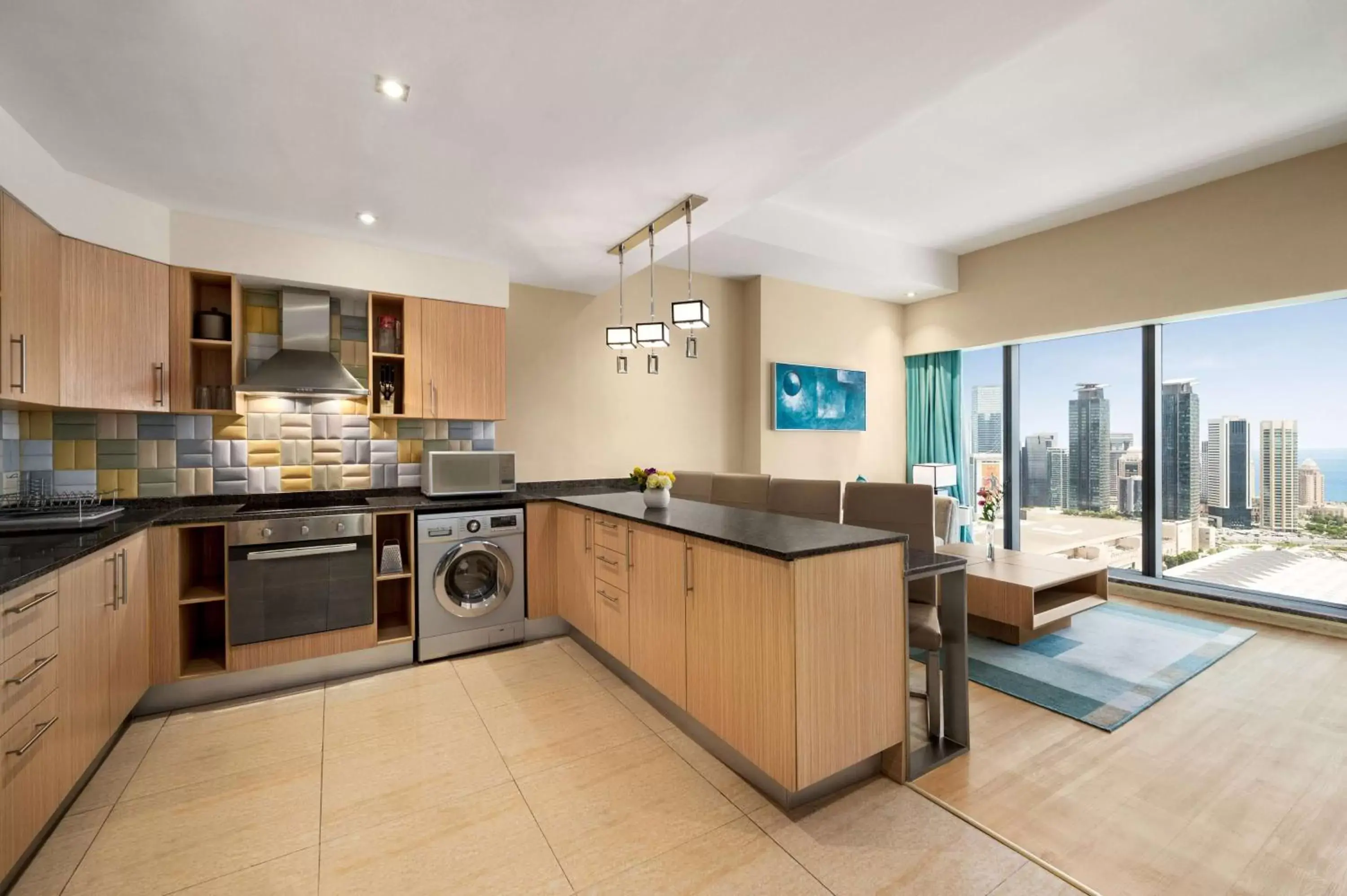 Bed, Kitchen/Kitchenette in Wyndham Doha West Bay