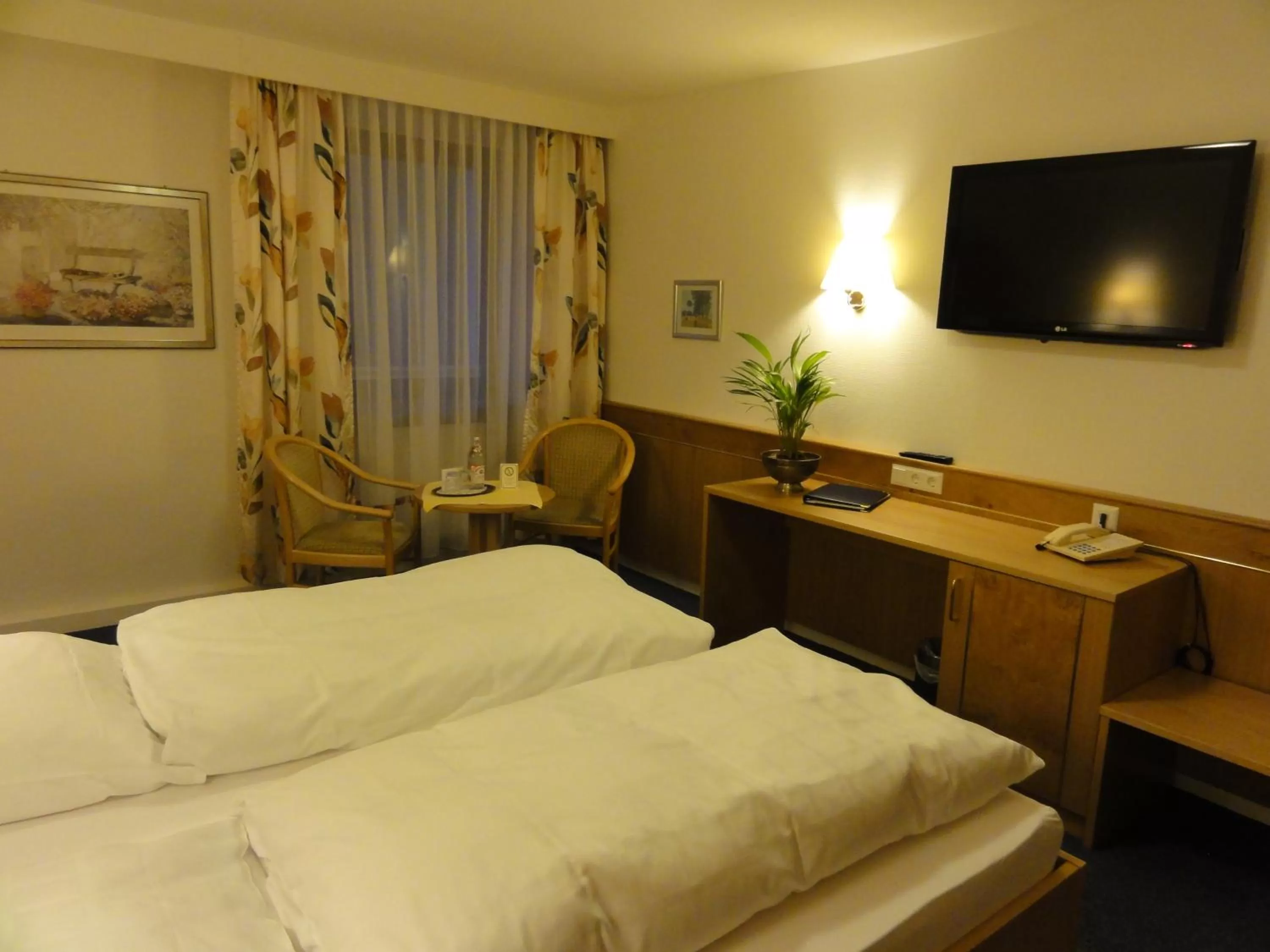 Photo of the whole room, Bed in Hotel Württemberger Hof Garni