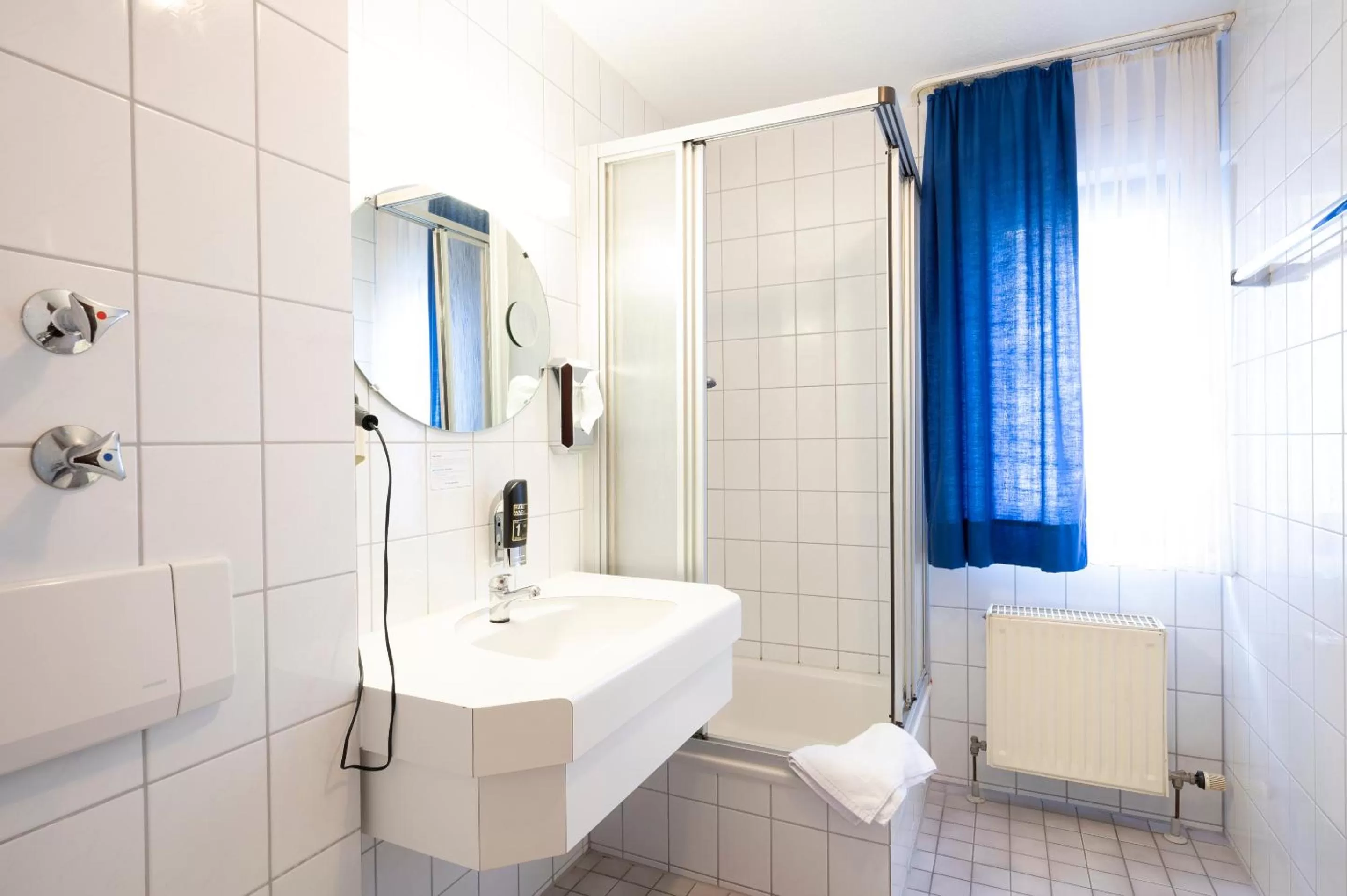 Shower in Hotel Astoria am Urachplatz