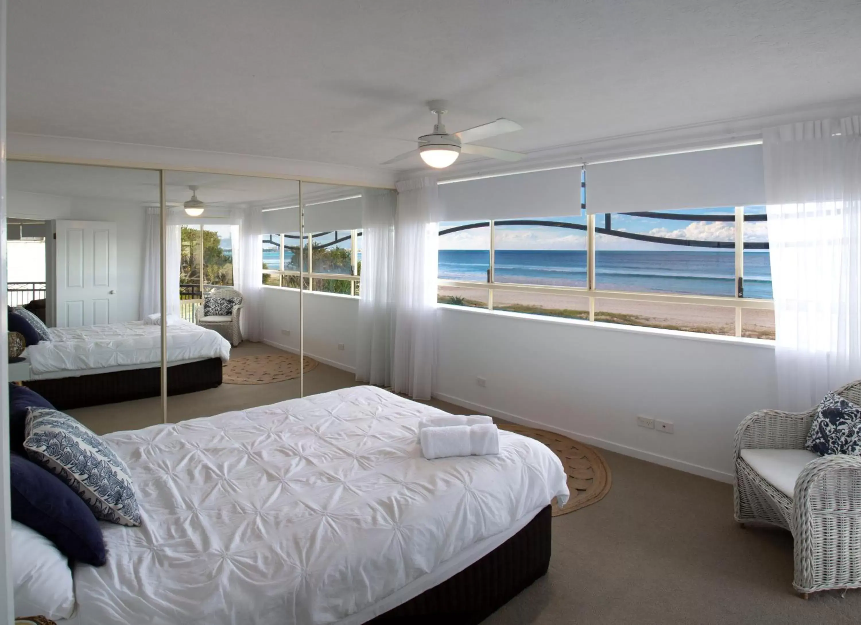 Bed in Golden Riviera Absolute Beachfront Resort