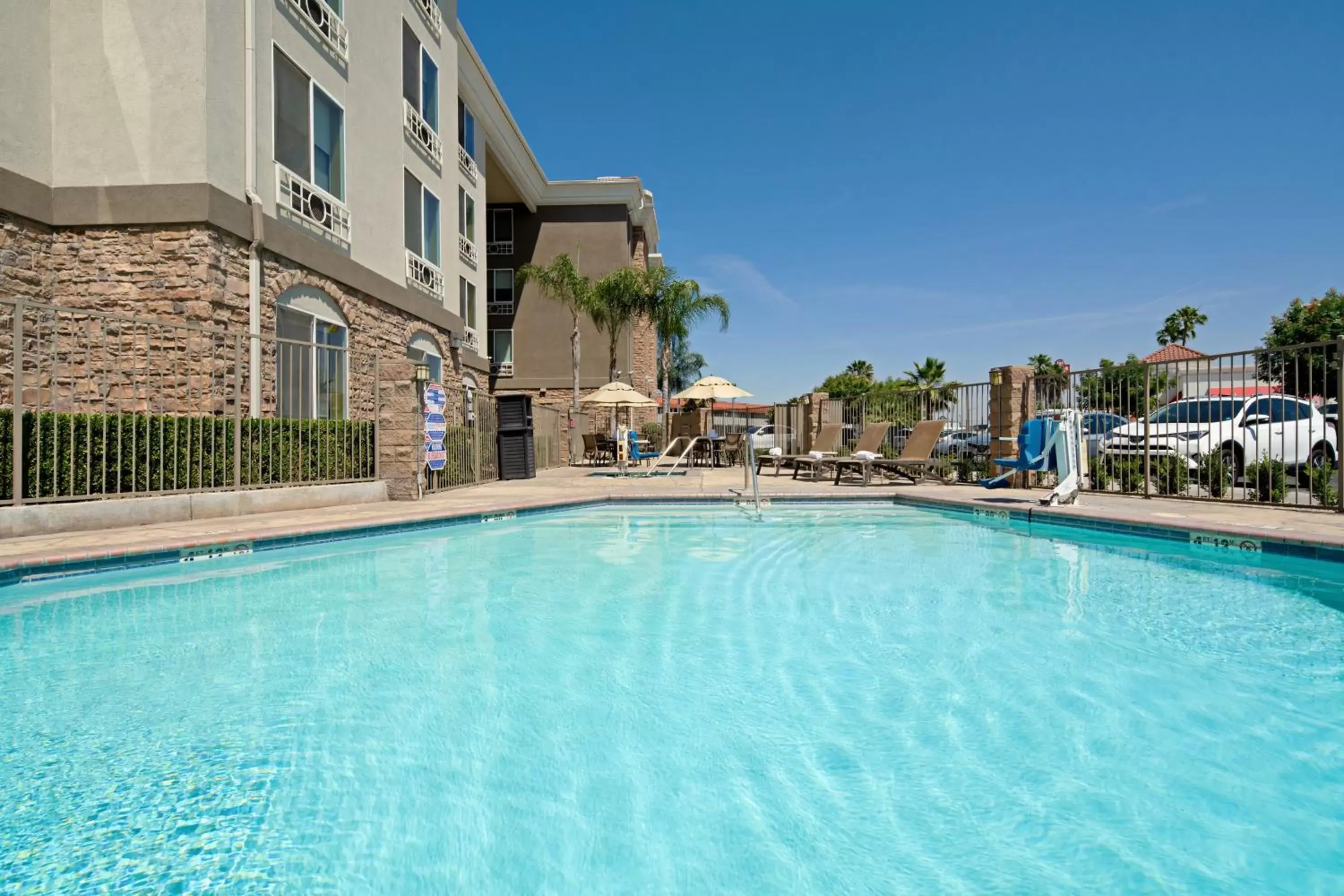 Swimming pool in Holiday Inn Express Fresno South by IHG Swimming pool in Holiday Inn Express Fresno South by IHG