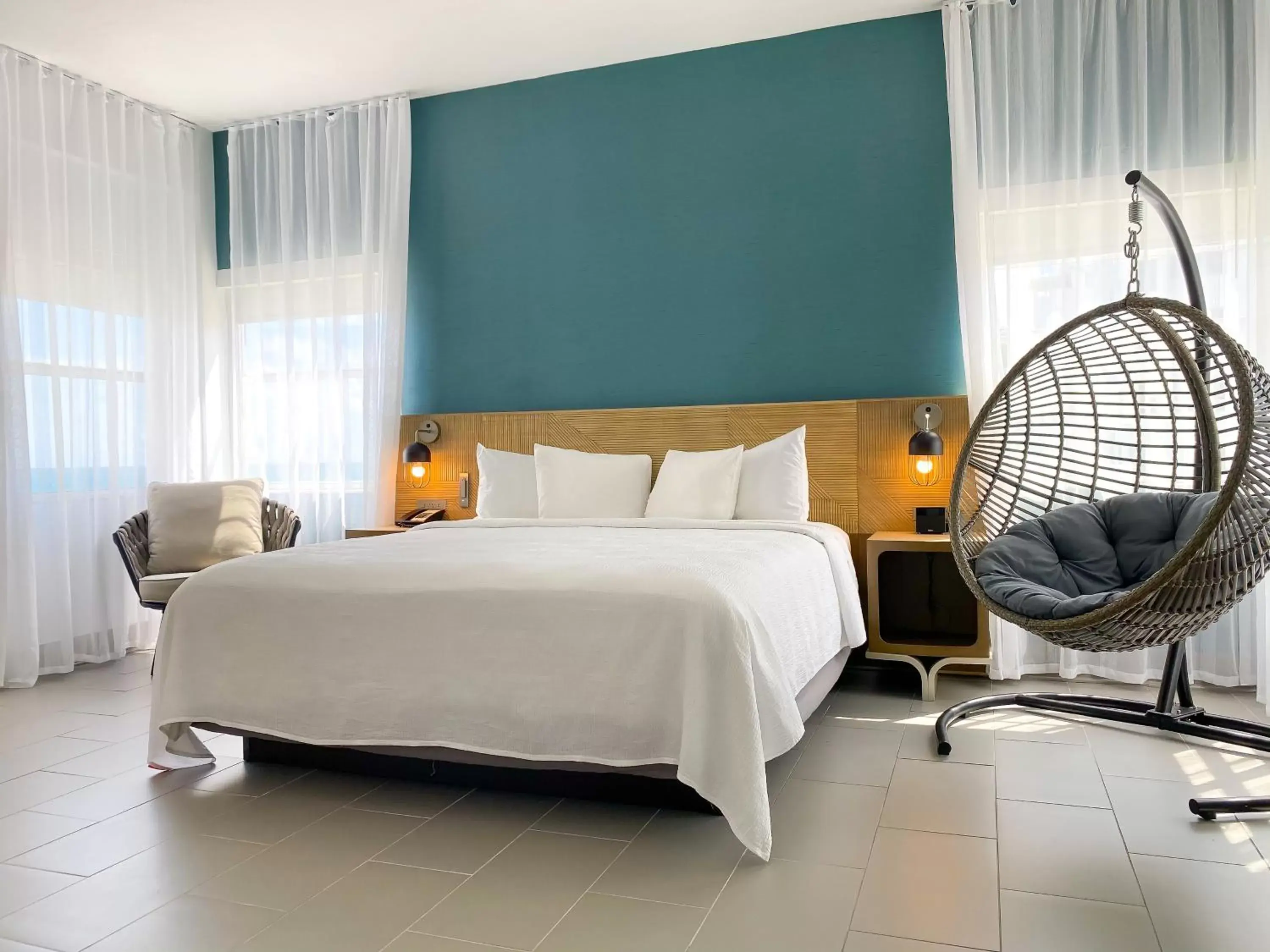 Bedroom, Bed in Marseilles Beachfront Hotel