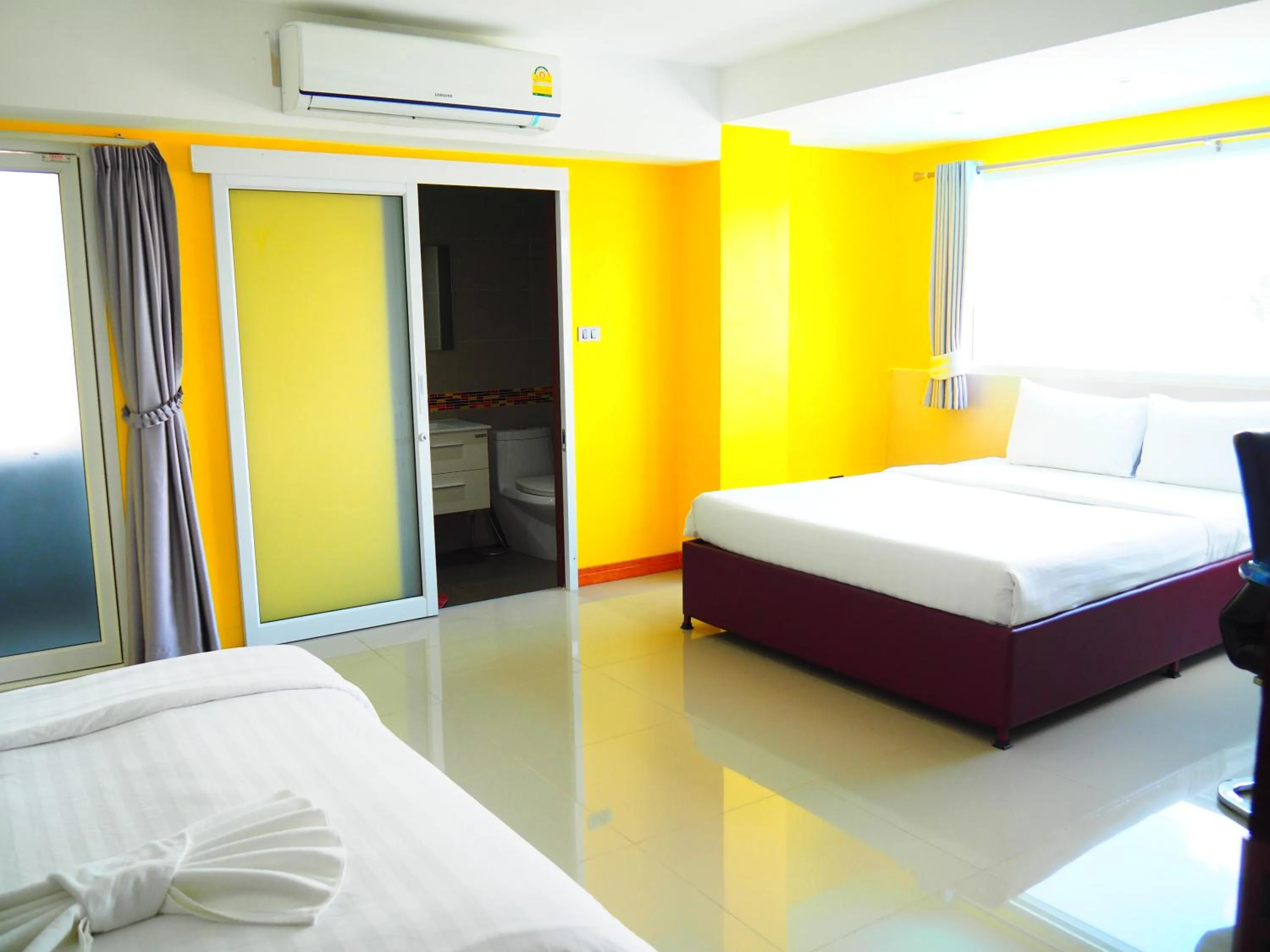 Bed in Blue Orchids Hotel