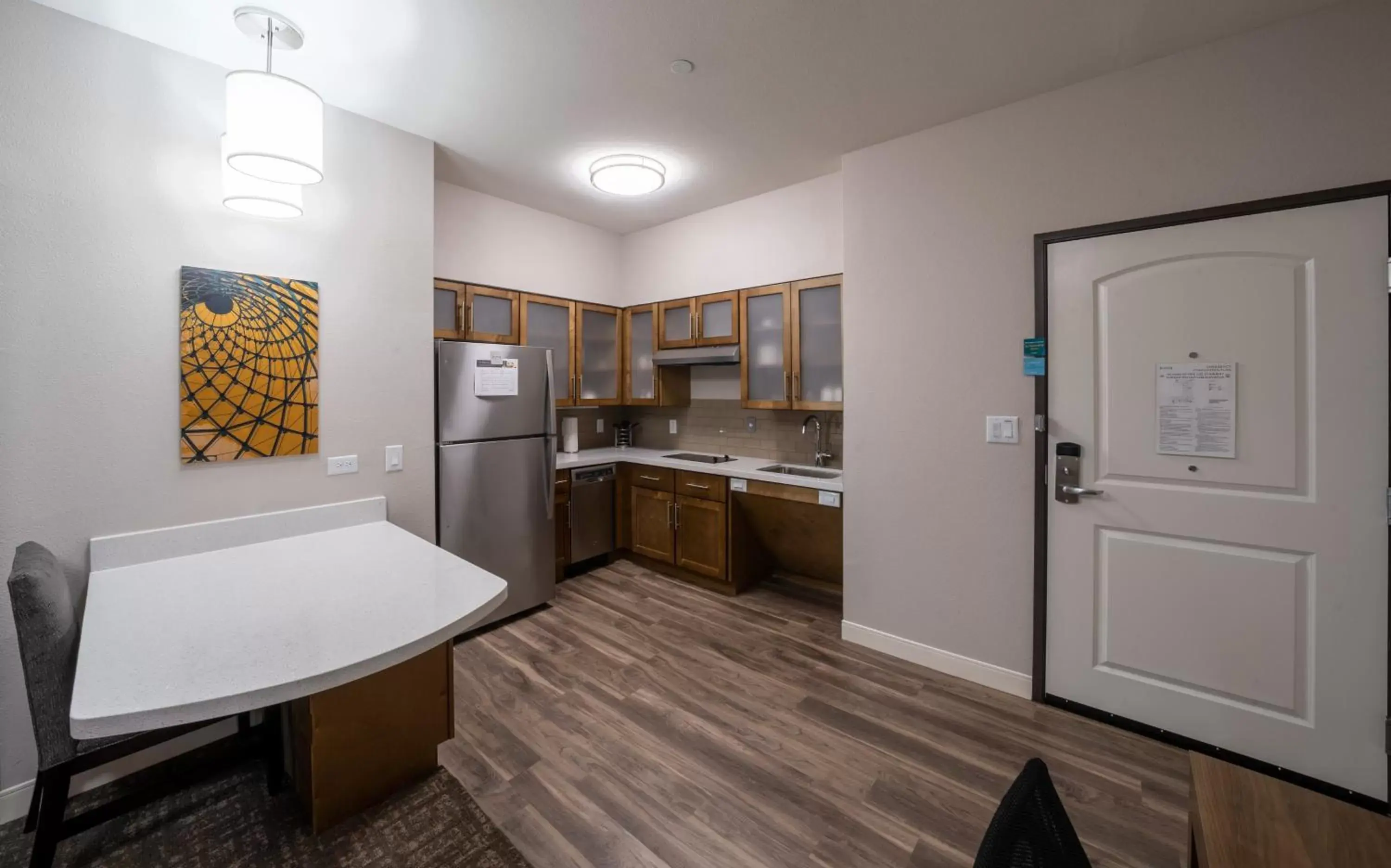 Photo of the whole room, Kitchen/Kitchenette in Staybridge Suites Houston East - Baytown, an IHG Hotel