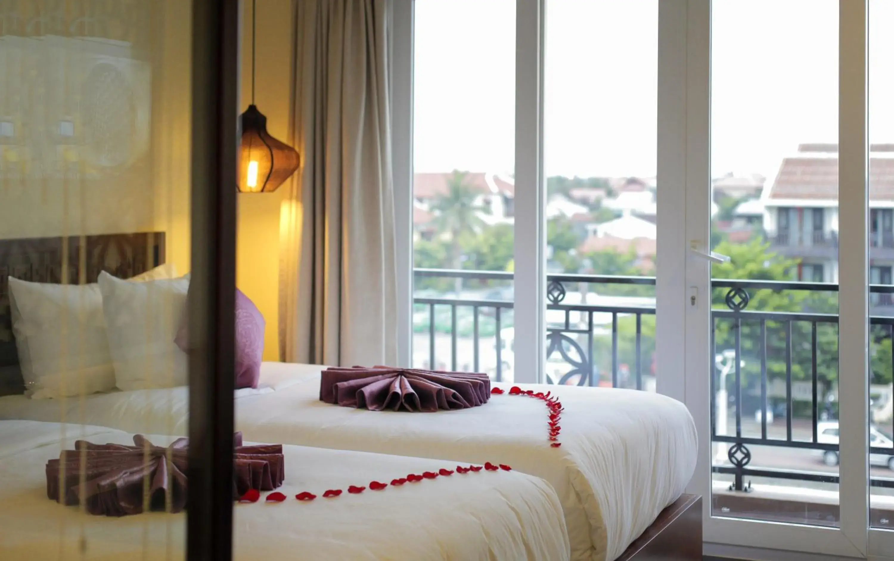 View (from property/room), Bed in River Suites Hoi An