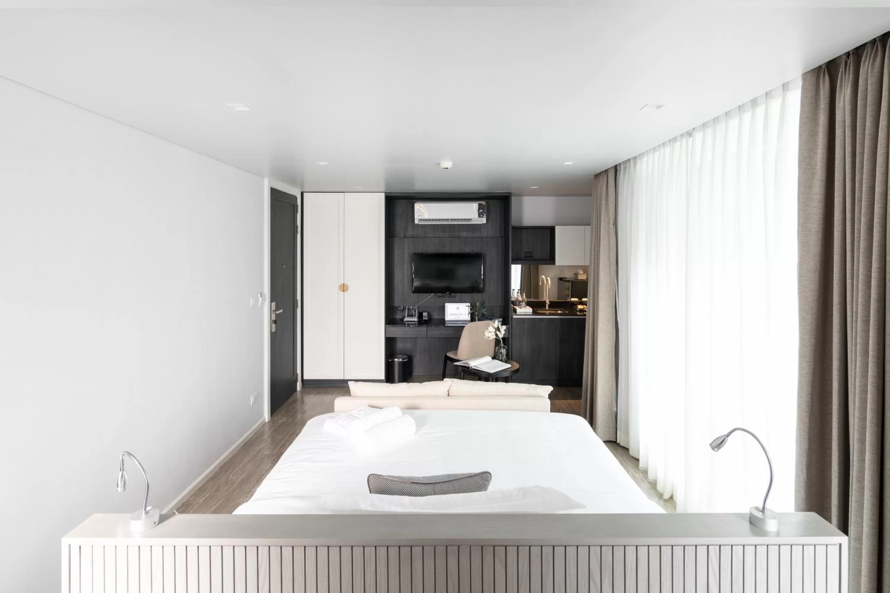 Bedroom in Apartelle Jatujak Hotel