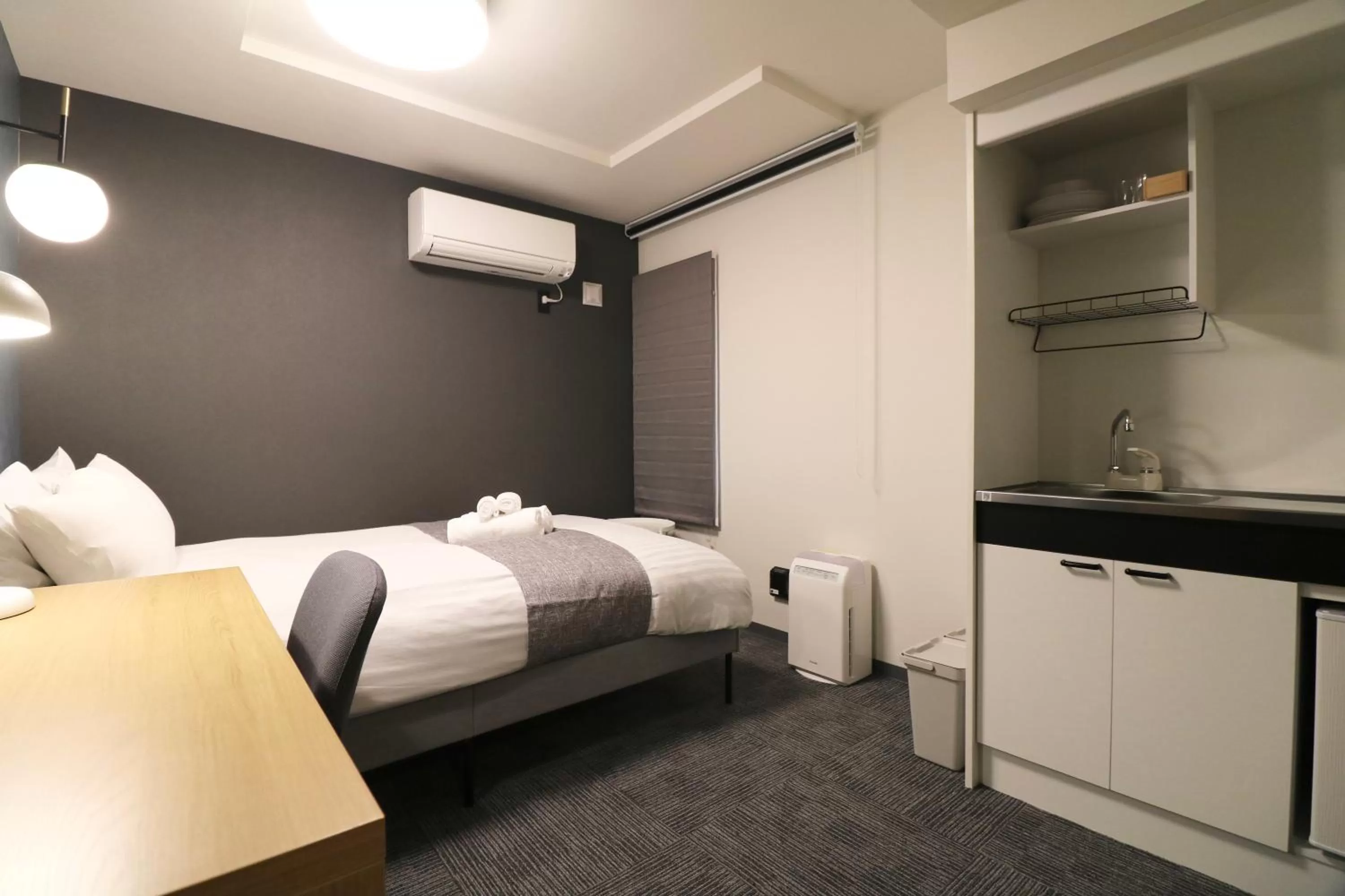 Bed in TAKETO STAY PREMIERE SAPPORO Eki