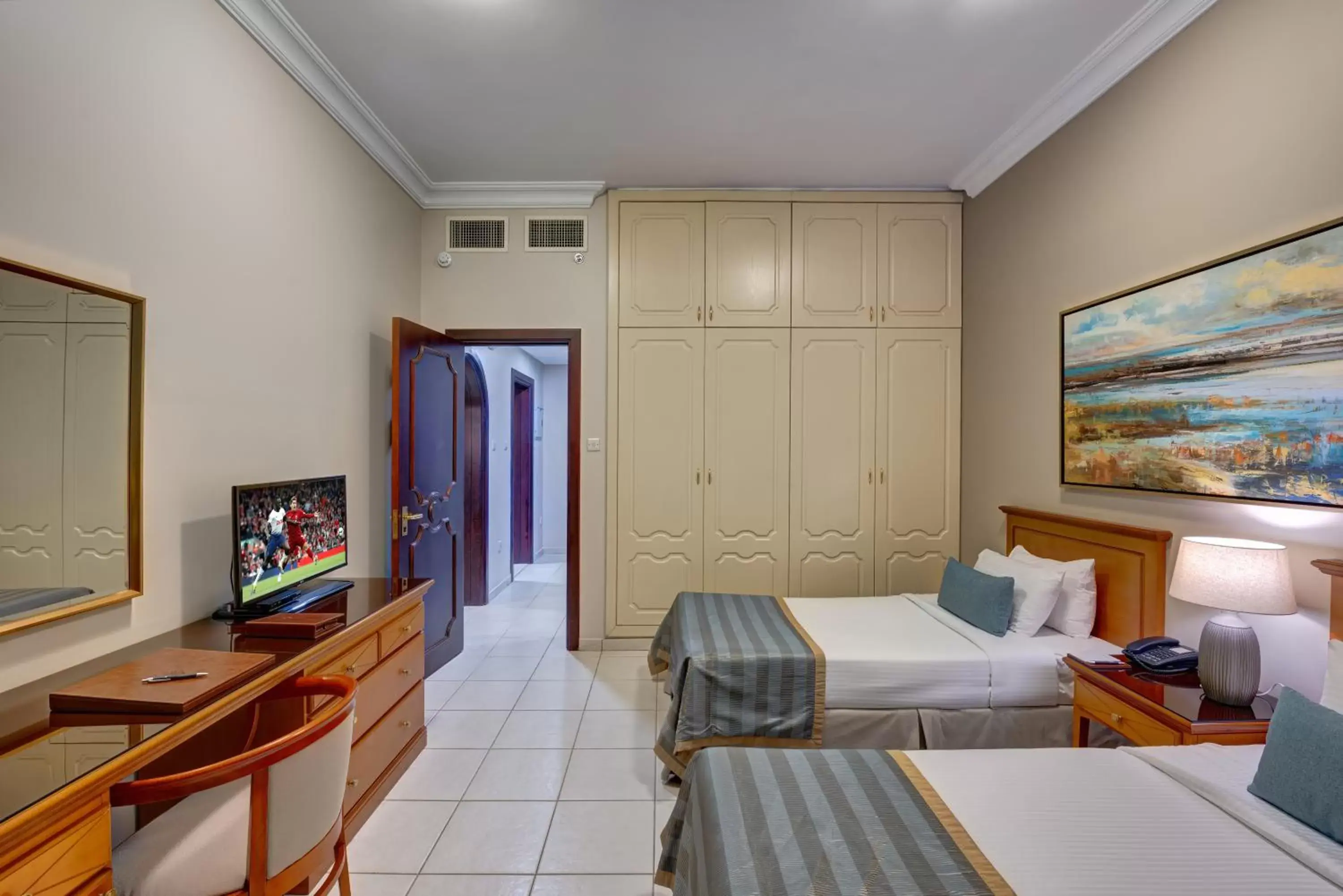 Bed, TV/Entertainment Center in Al Nakheel Hotel Apartments Abu Dhabi