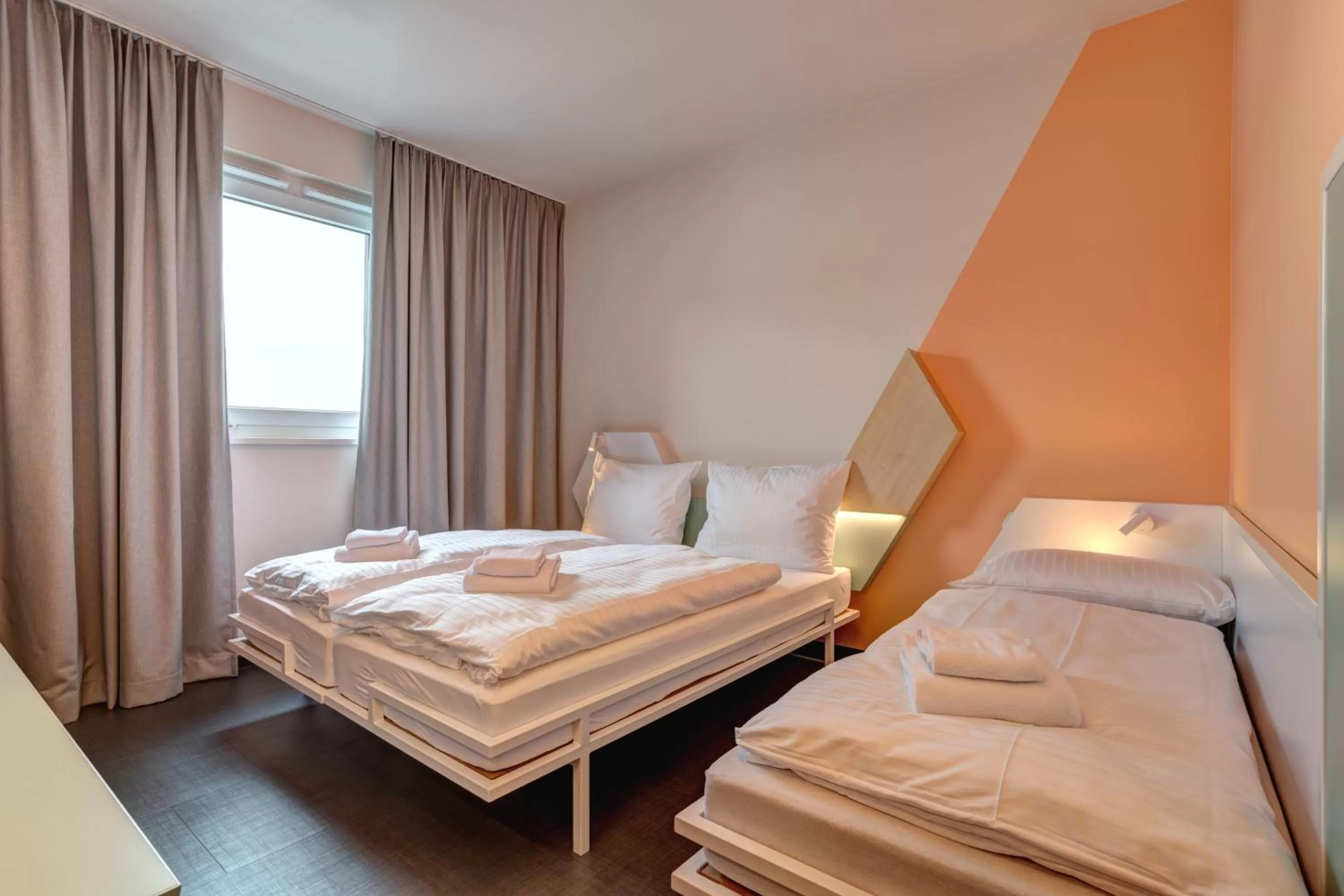 Photo of the whole room, Bed in MEININGER Hotel Heidelberg Hauptbahnhof