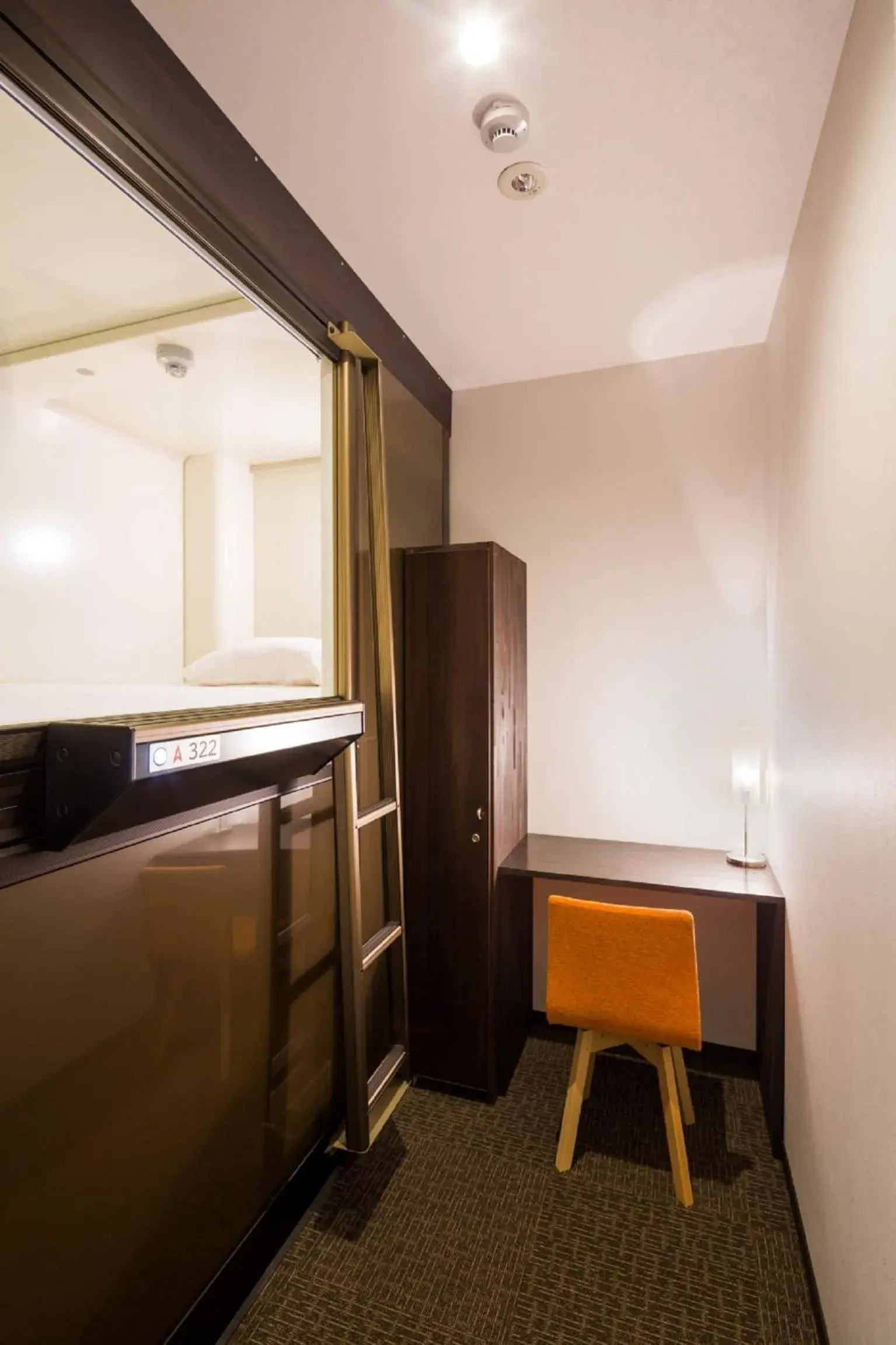 Photo of the whole room, TV/Entertainment Center in Capsule Hotel CUBE Hiroshima
