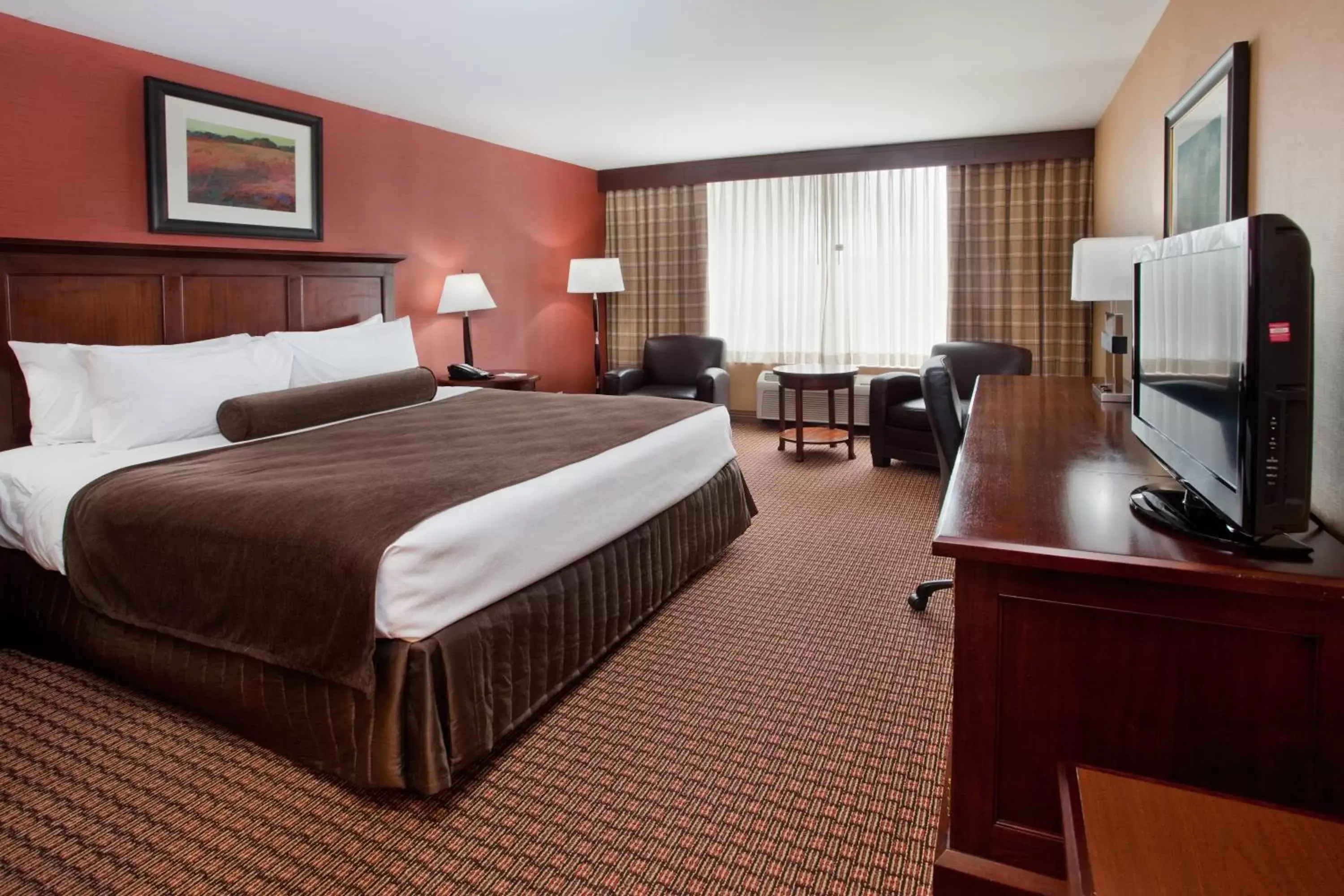 Photo of the whole room, Bed in Ramada by Wyndham Cleveland Independence
