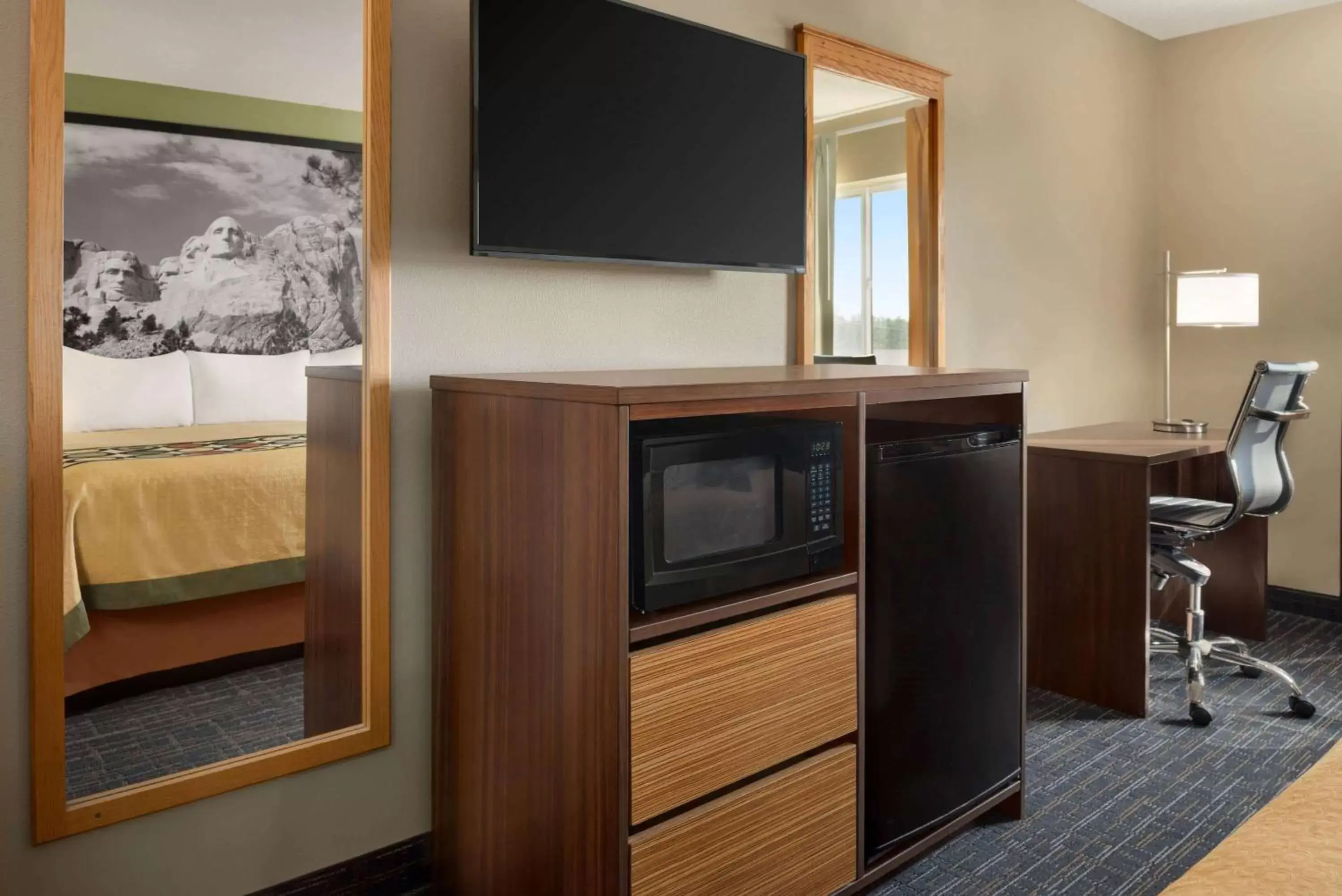 Photo of the whole room, TV/Entertainment Center in Super 8 by Wyndham Sioux Falls