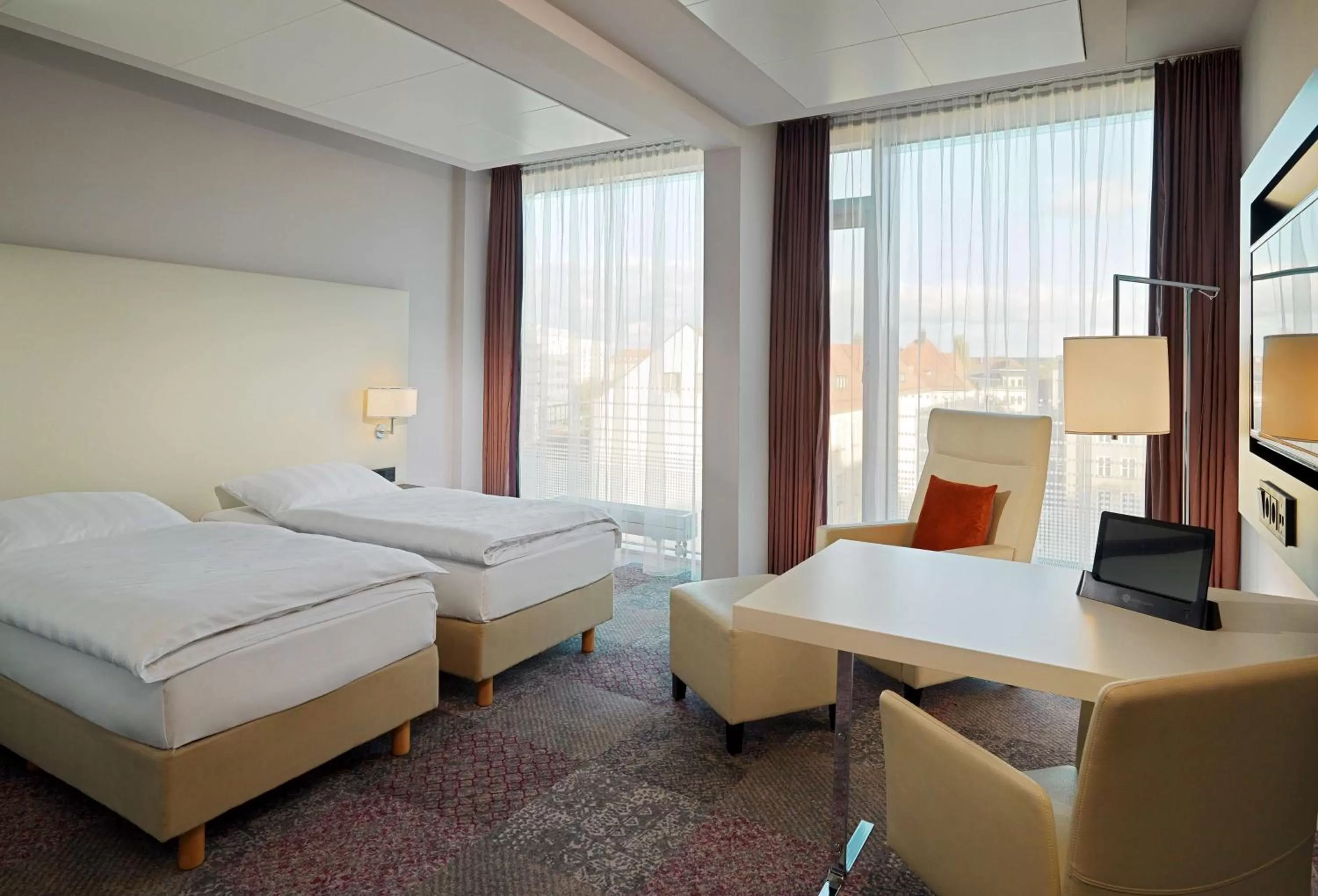 Photo of the whole room, Bed in Radisson Blu Hotel Leipzig