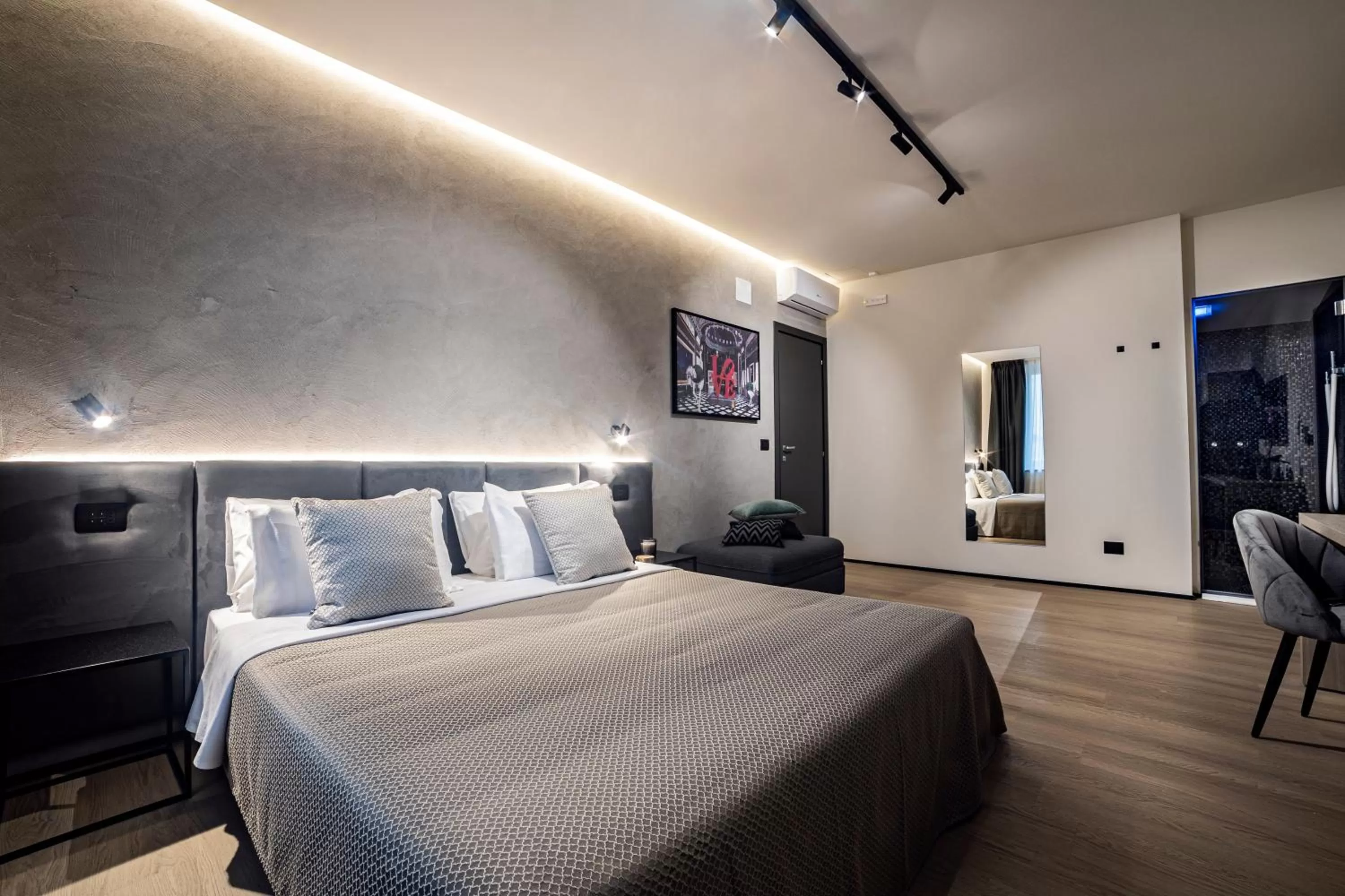 Bed in Corso 84 Luxury Suites