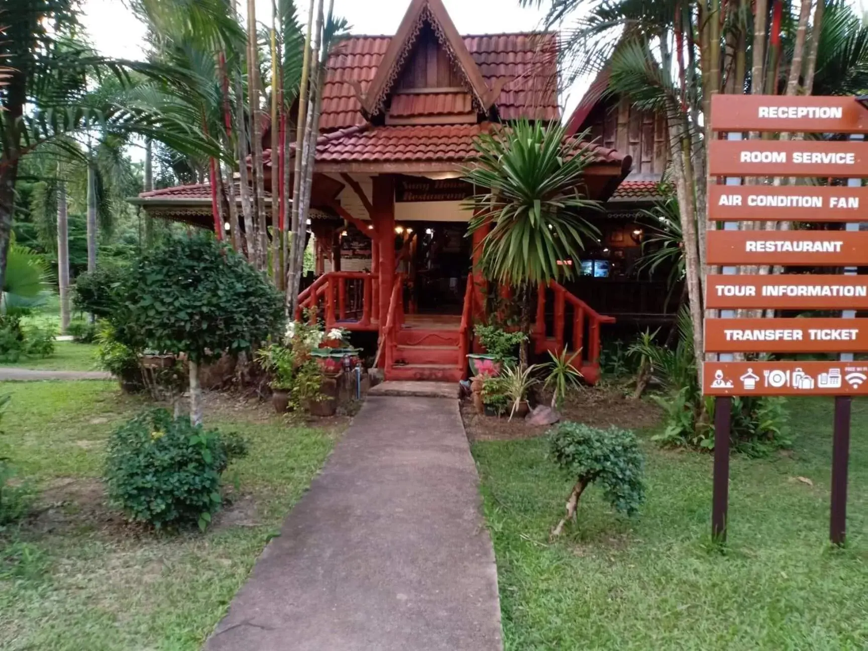 Facade/entrance, Garden in Khao Sok Nung House