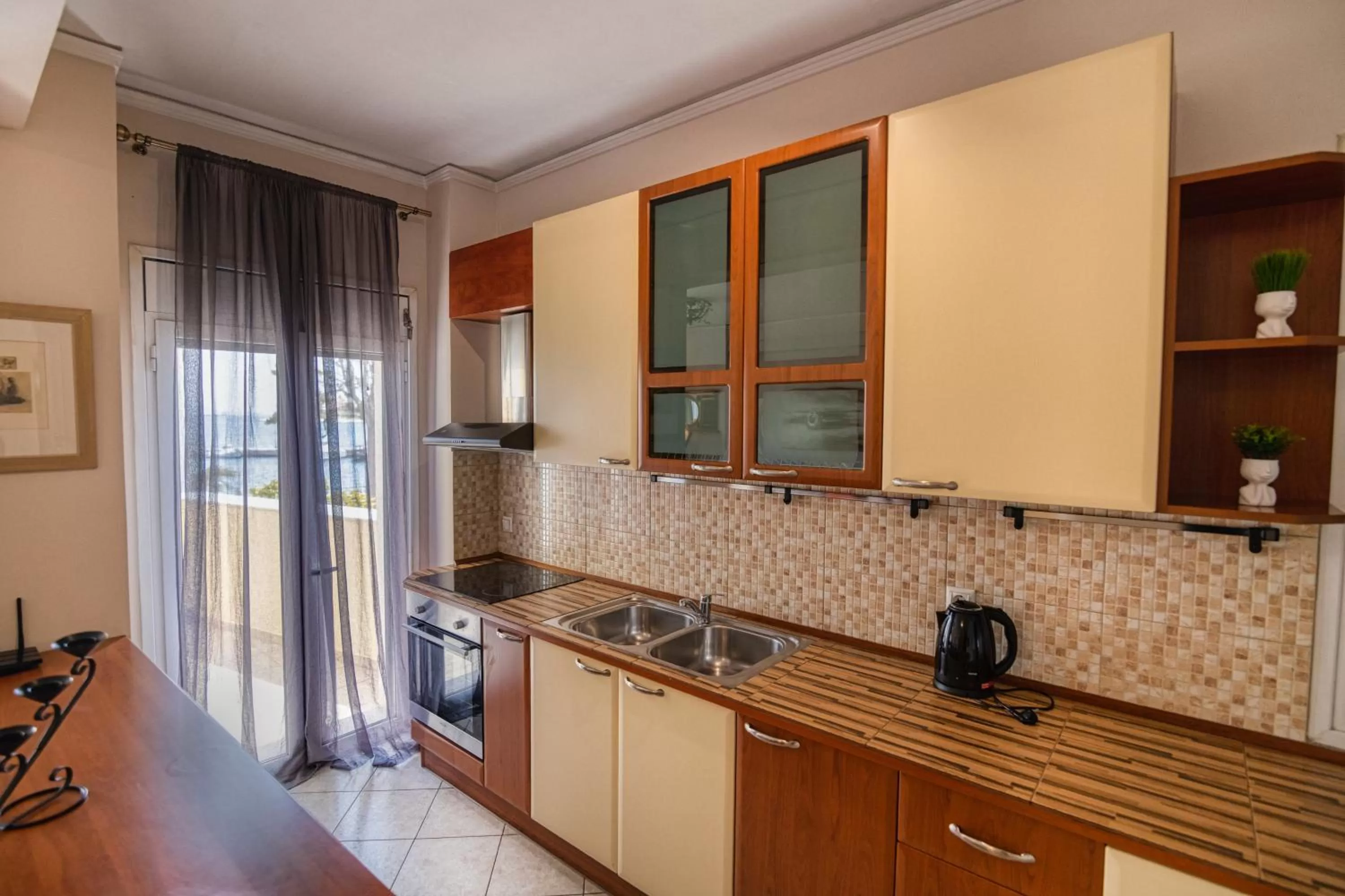 Kitchen or kitchenette in Votsalakia Hotel & Luxury Apartments