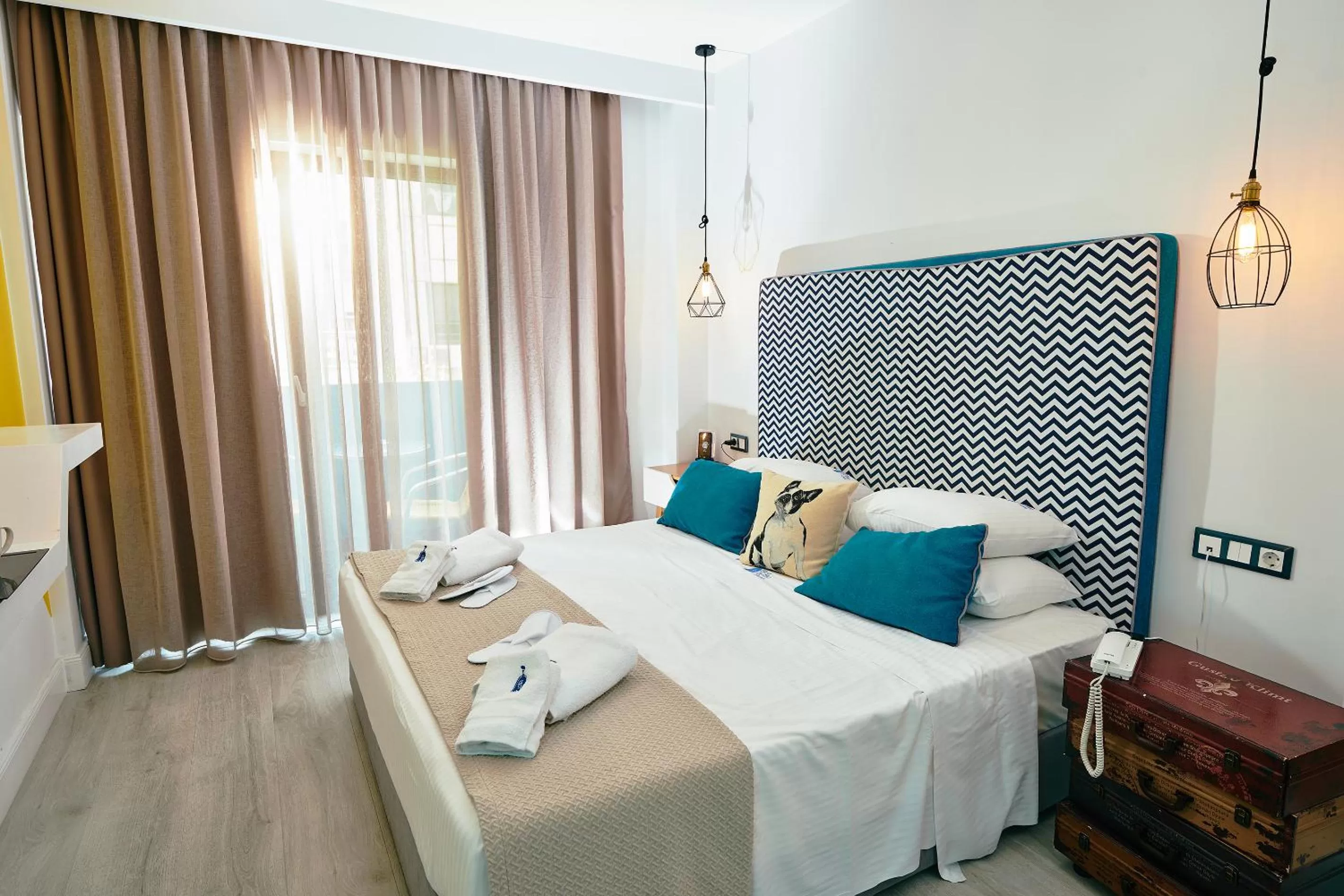 Bed in Blue Bottle Boutique Hotel