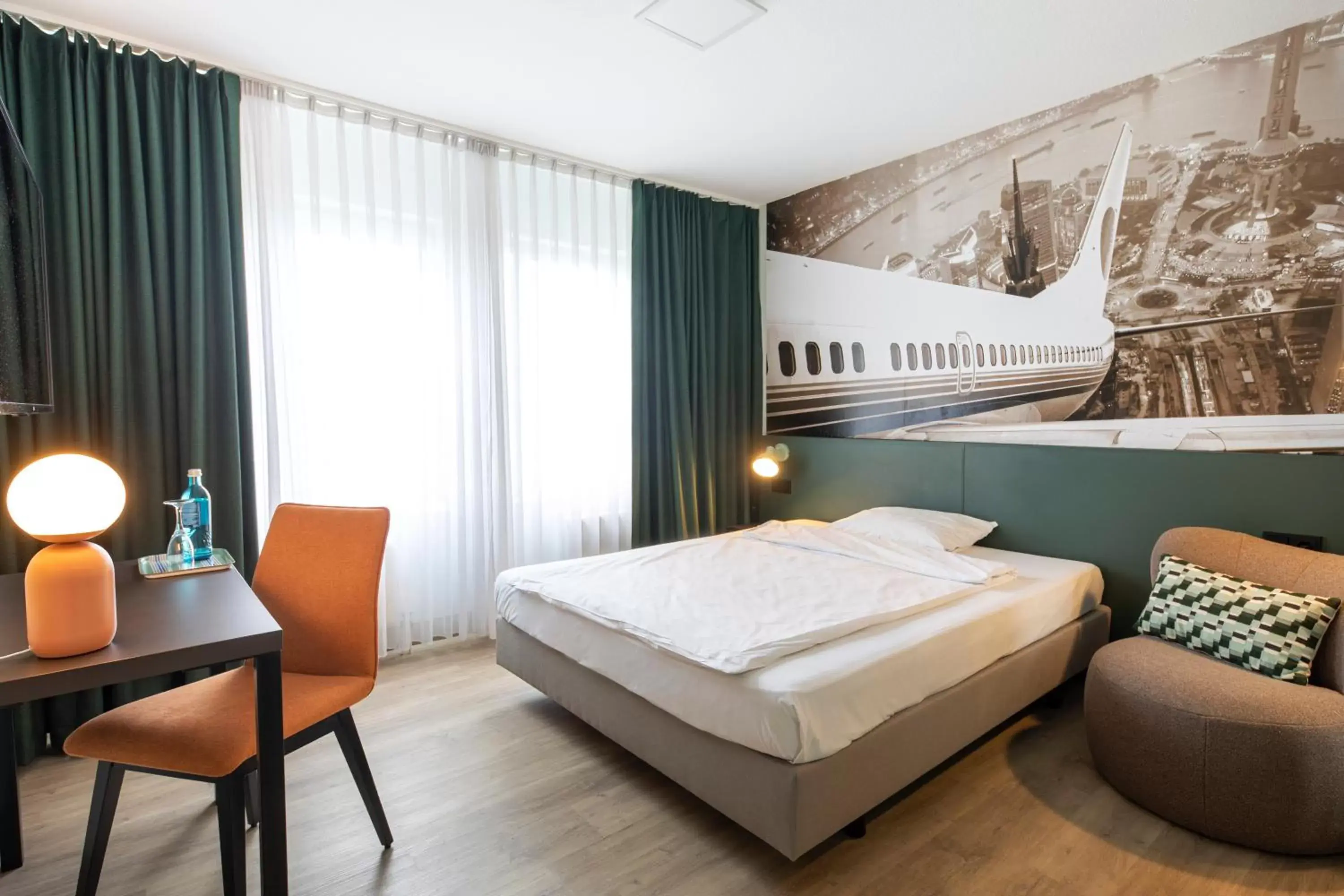 Photo of the whole room, Bed in ACHAT Hotel Frankfurt Airport