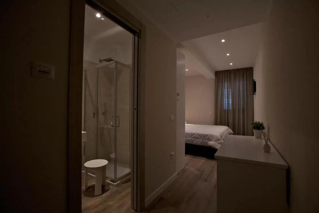 Bed in Onorati Hotel