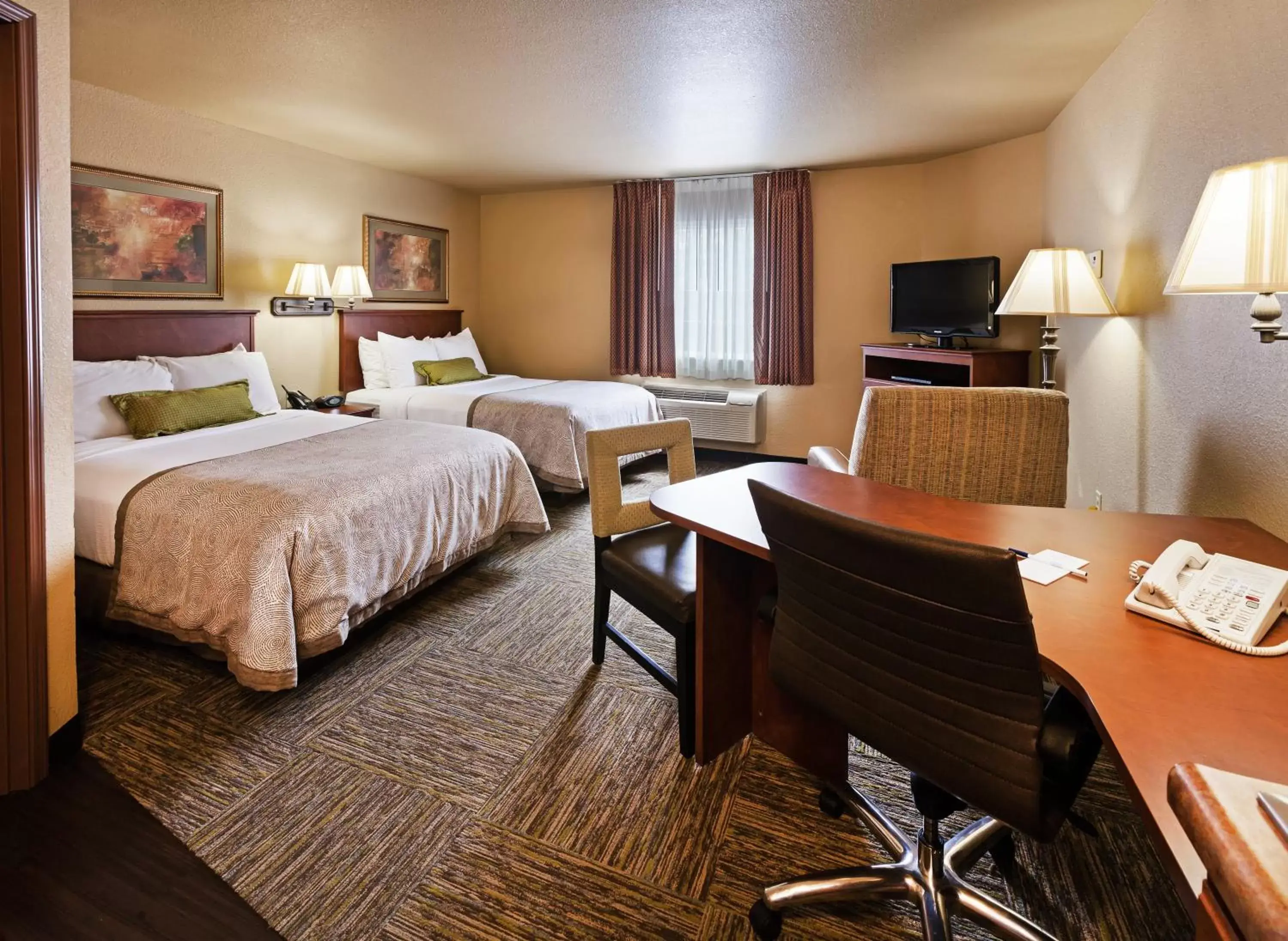 Photo of the whole room in Candlewood Suites St. Robert, an IHG Hotel
