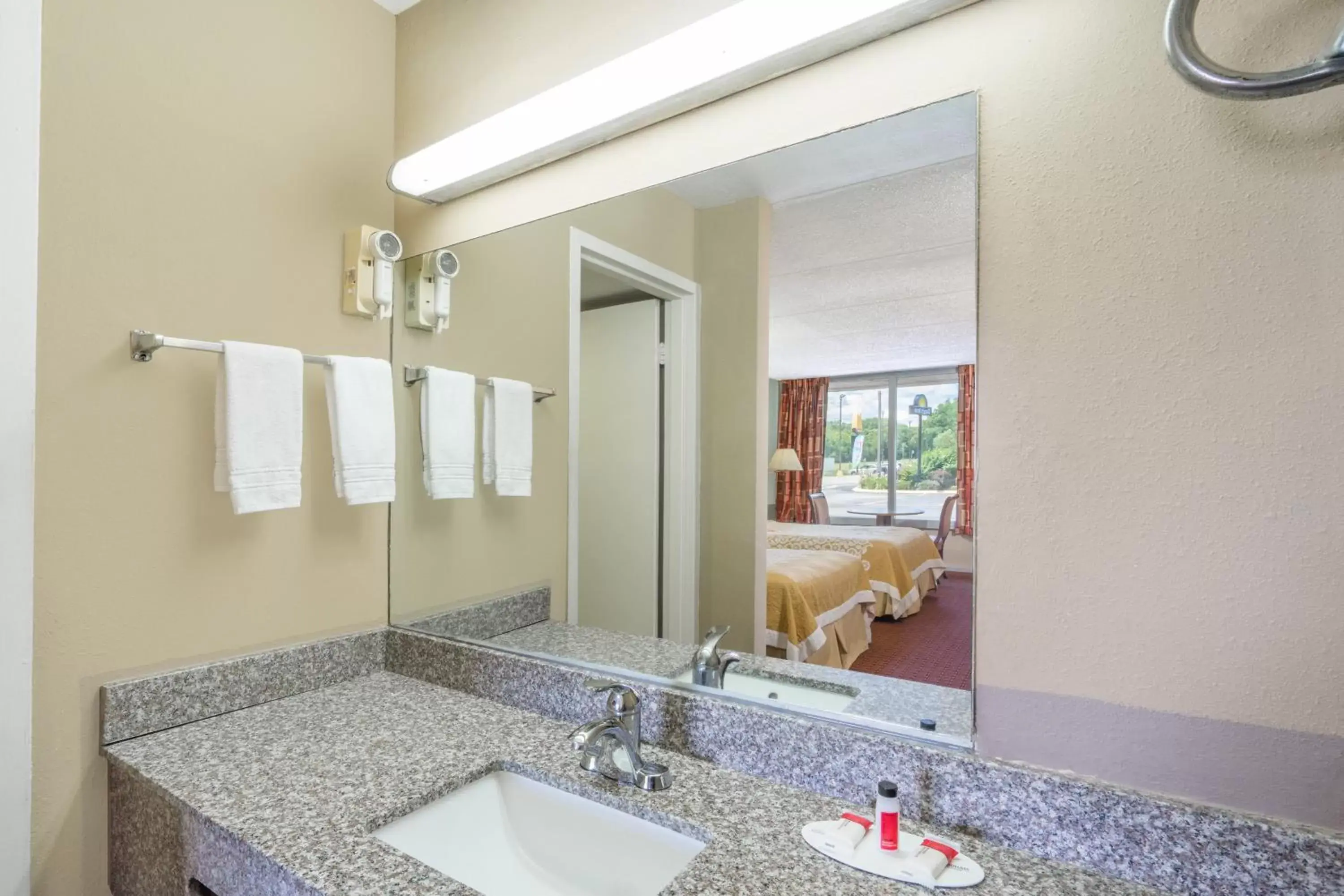 Bathroom in Days Inn by Wyndham Hurricane Mills