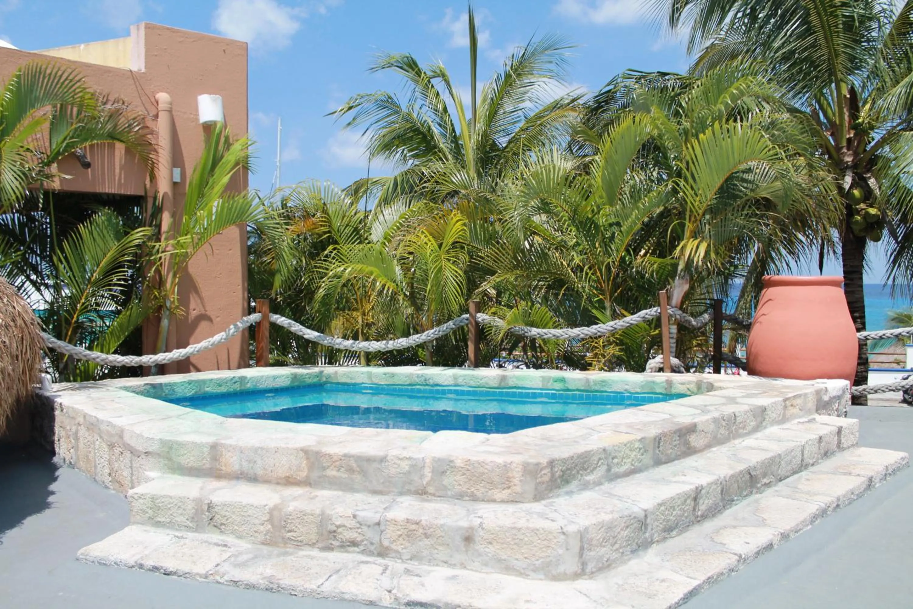 Hot Tub in Casa del Mar Cozumel Hotel & Dive Resort with free access to an exclusive beach club
