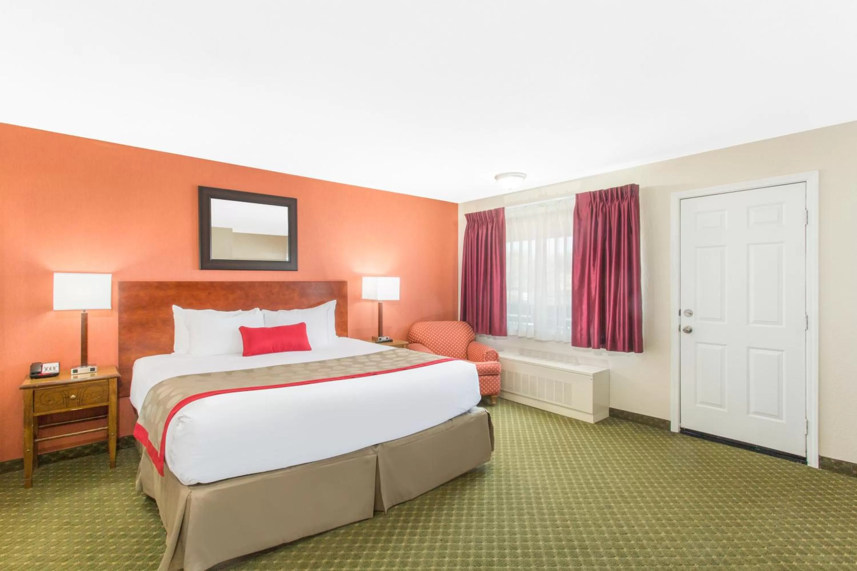 Bed in Ramada by Wyndham Elko Hotel at Stockmen's Casino
